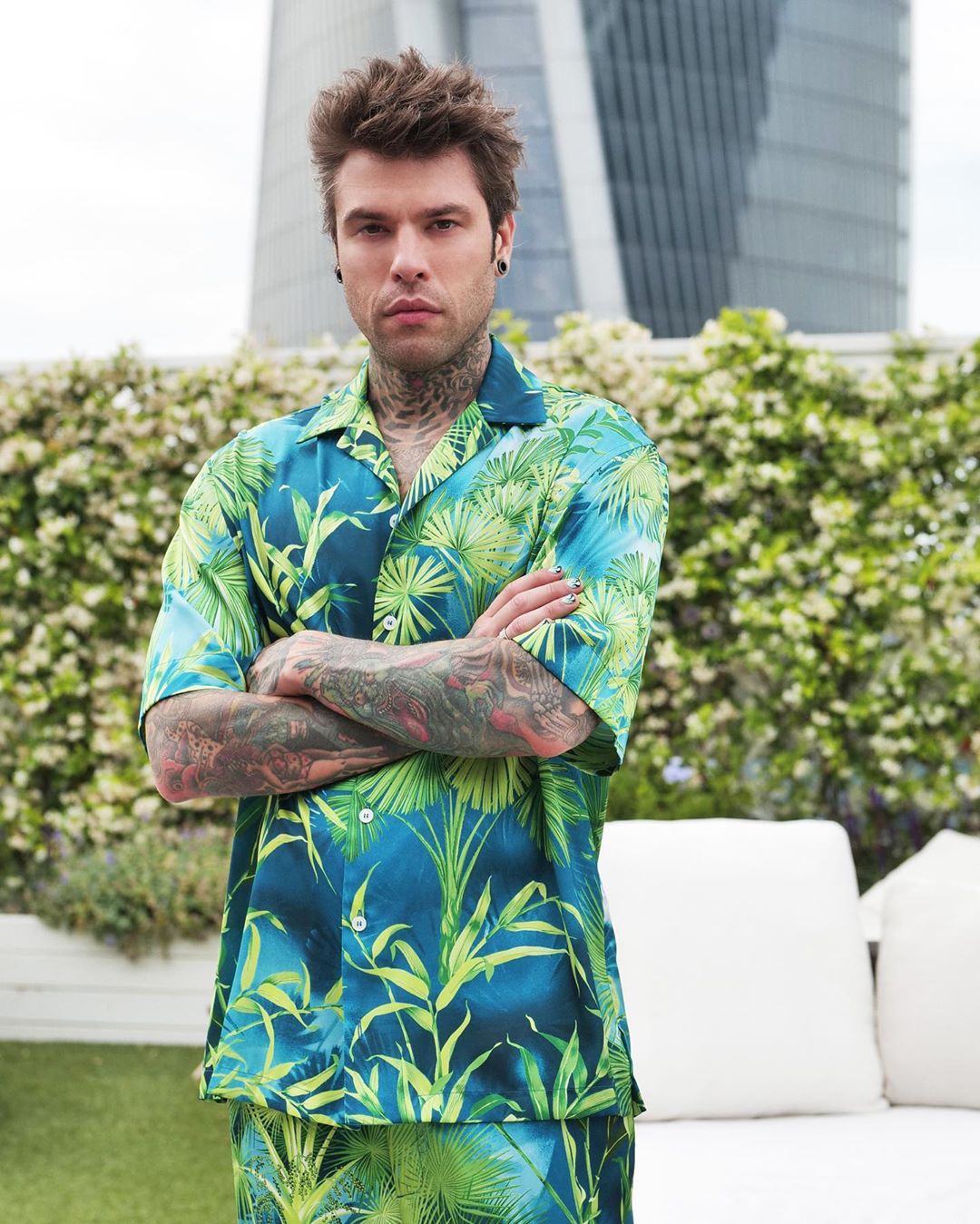 Versace - Rapper, singer and songwriter @fedez is DVTV’s second guest, pictured wearing Jungle-print designs for a #DateWithDonatella.