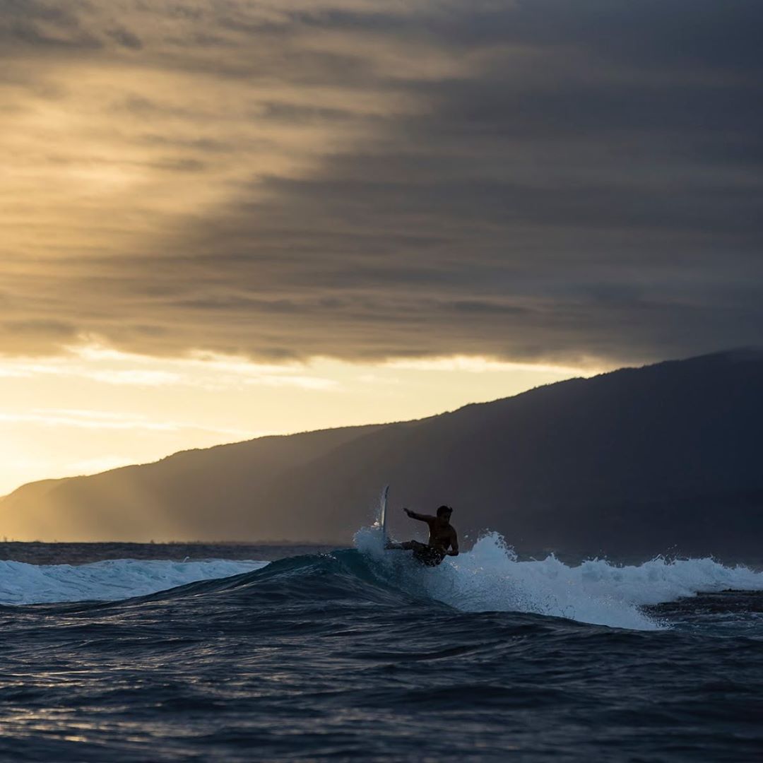Quiksilver - A good sunset is a great excuse to surf small waves. @floresjeremy, taking it in in Tahiti.