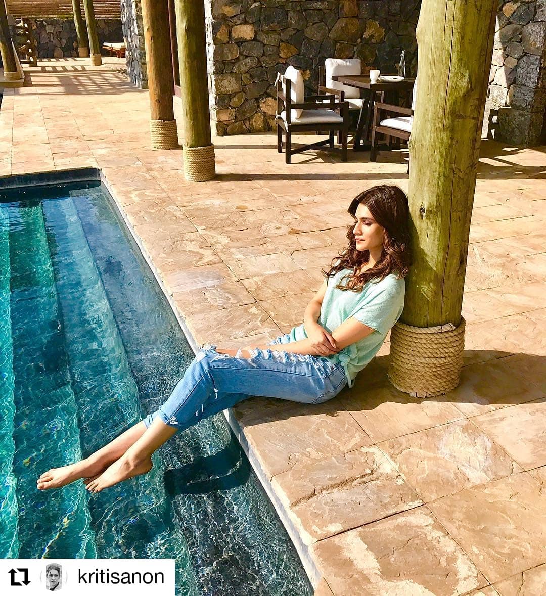 NNNOW - Our #WCW Kriti Sanon is definitely making us dream about that perfect vacay outfit. We love how she's wearing a mint green t-shirt along with distressed denims for that casual yet easy look....