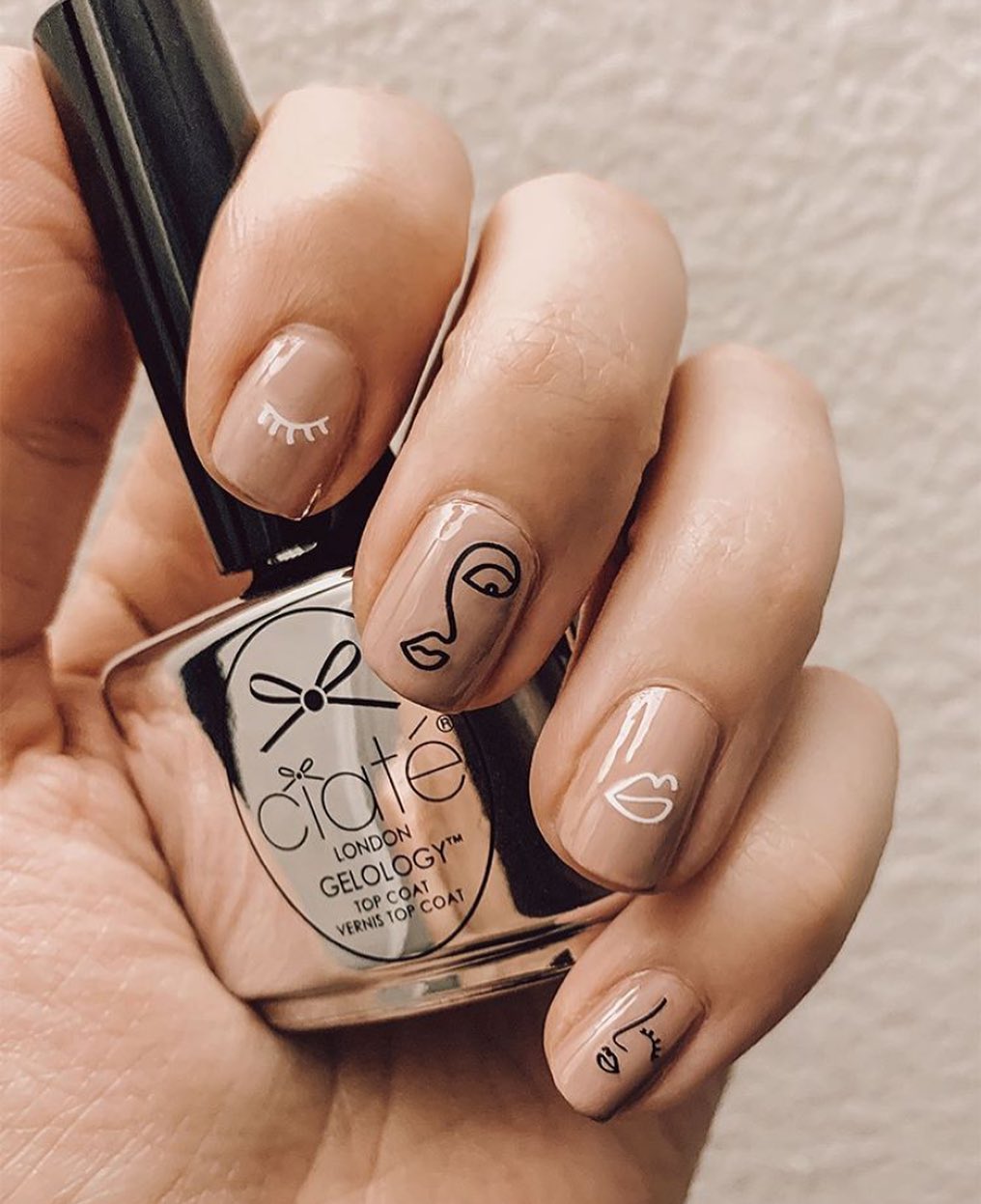 Ciaté London - Give them face honey.... (even on your nails 💅🏻) love our #cheatsheets abstract illustrations nail stickers on a neutral nail 💅🏻 #regram @cleanbeautycat @sephora