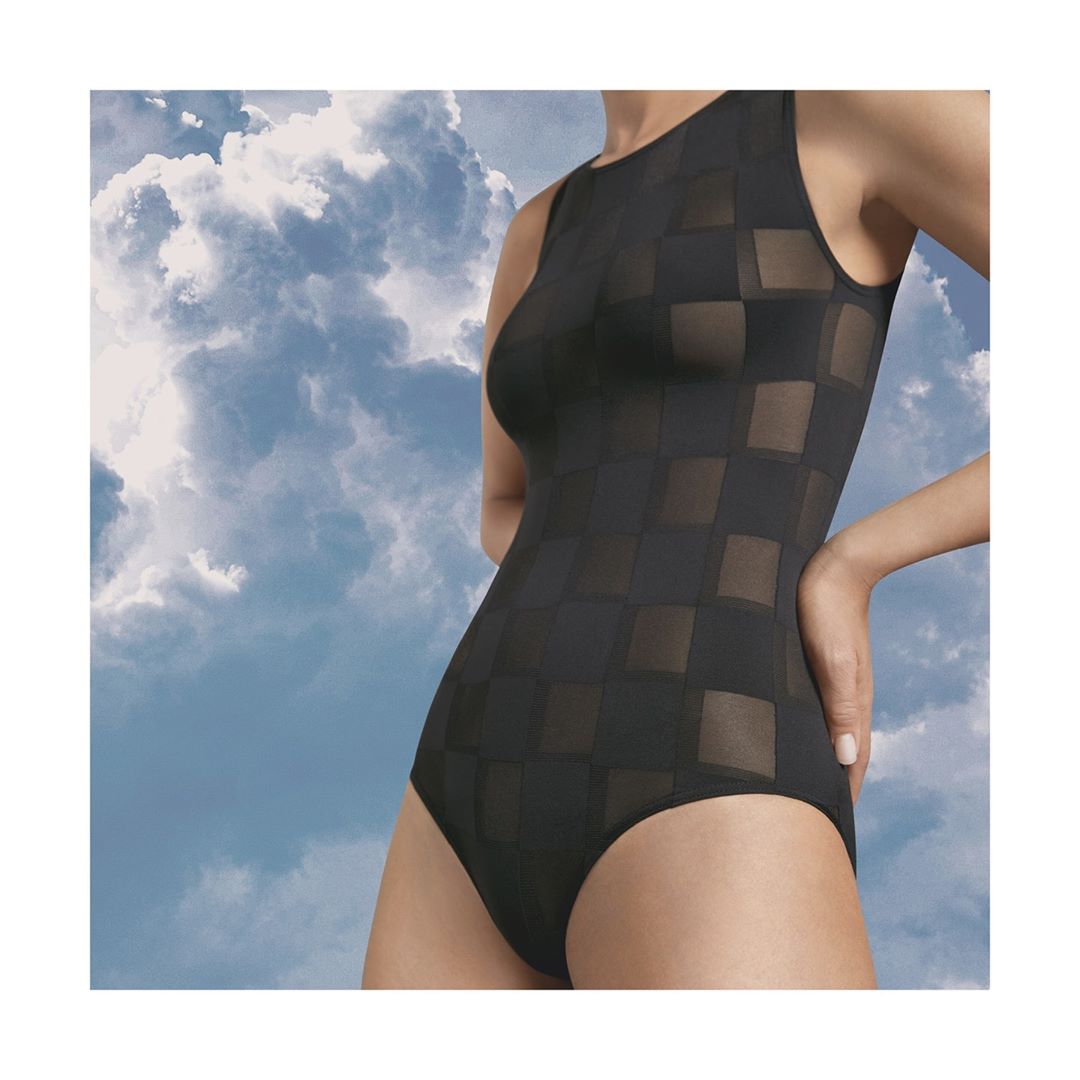 Wolford - Revisited from The Archive: The Tethys bodysuit continues our tradition of timeless yet contemporary styles.⁠
⁠
#Wolfordbodysuits #BirthdayBodies #Wolford70