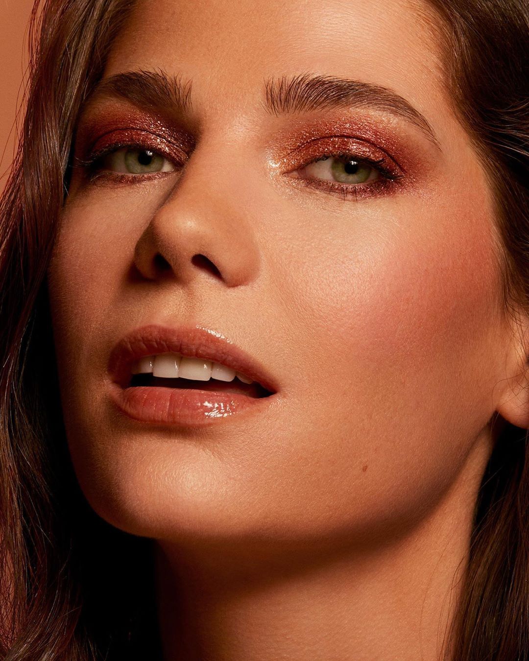 NARS Cosmetics - That summer glow. 
Featuring:
Powerchrome Loose Eye Pigment in Slam, Stricken, Hammered, Oil-Infused Lip Tint in Laguna, Bronzing Powder in San Juan, Radiant Creamy Concealer, Tinted...