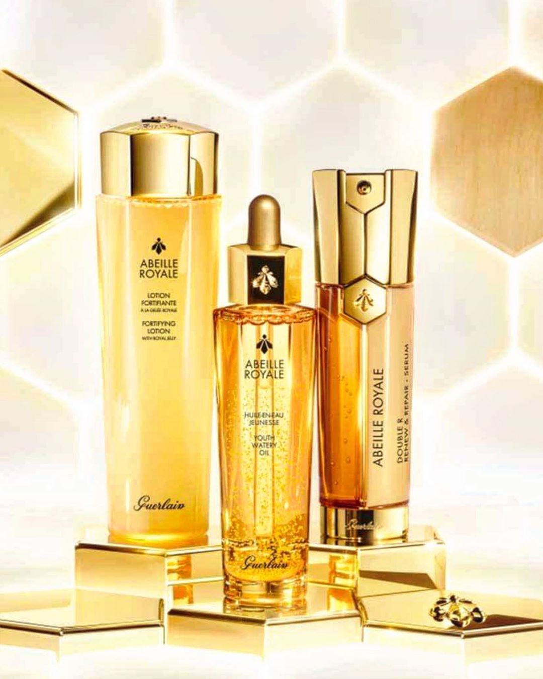 Guerlain - Discover the power of Abeille Royale's Golden Skincare Trio.

When used together, skin radiates a youthful glow, as though boosted from within.*

First, the Fortifying Lotion leaves skin hy...