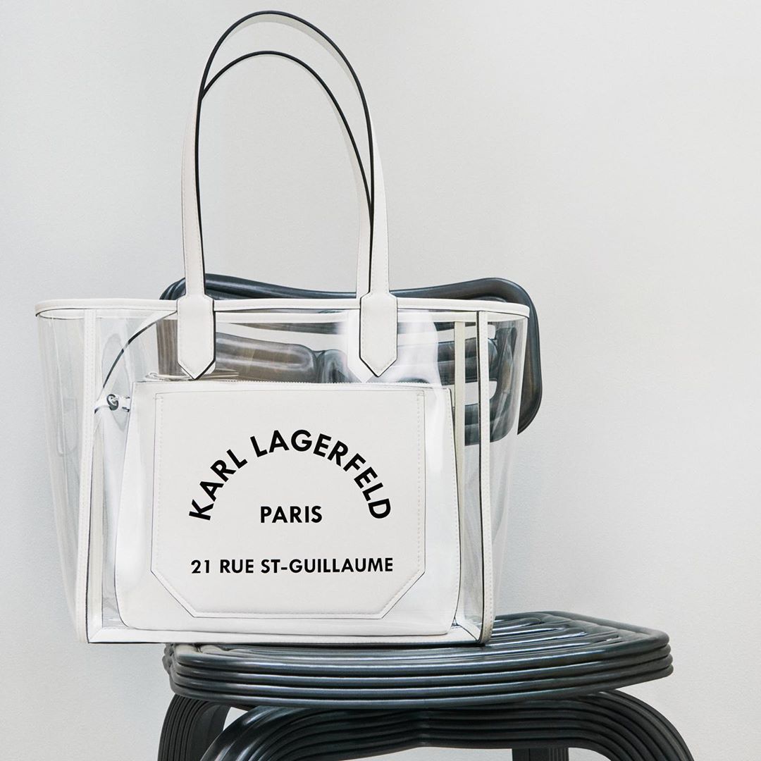 KARL LAGERFELD - Standout accessories are here for summer. ☀️ Pack your day-to-day essentials in the K/Journey tote with a transparent finish. Tap to shop. #KARLLAGERFELD
