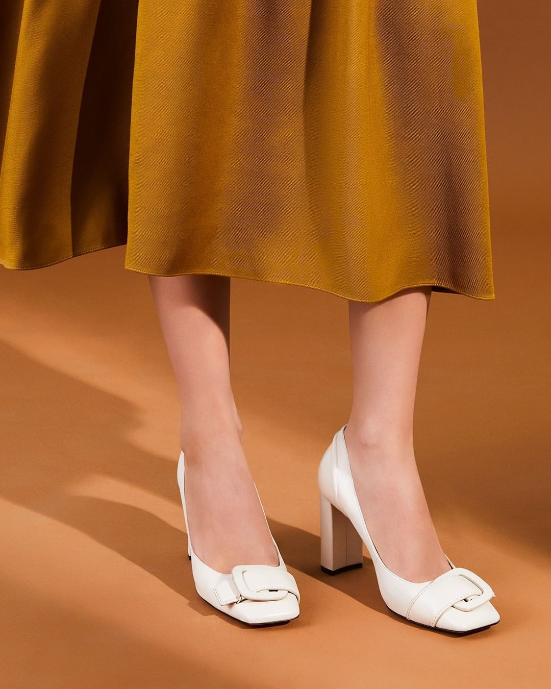 Santoni - Block heels, buckles and a fluid silhouette; a sophisticated heel with a decidedly retro spirit. #Santoni #SantoniFW20 #MadeinSantoni