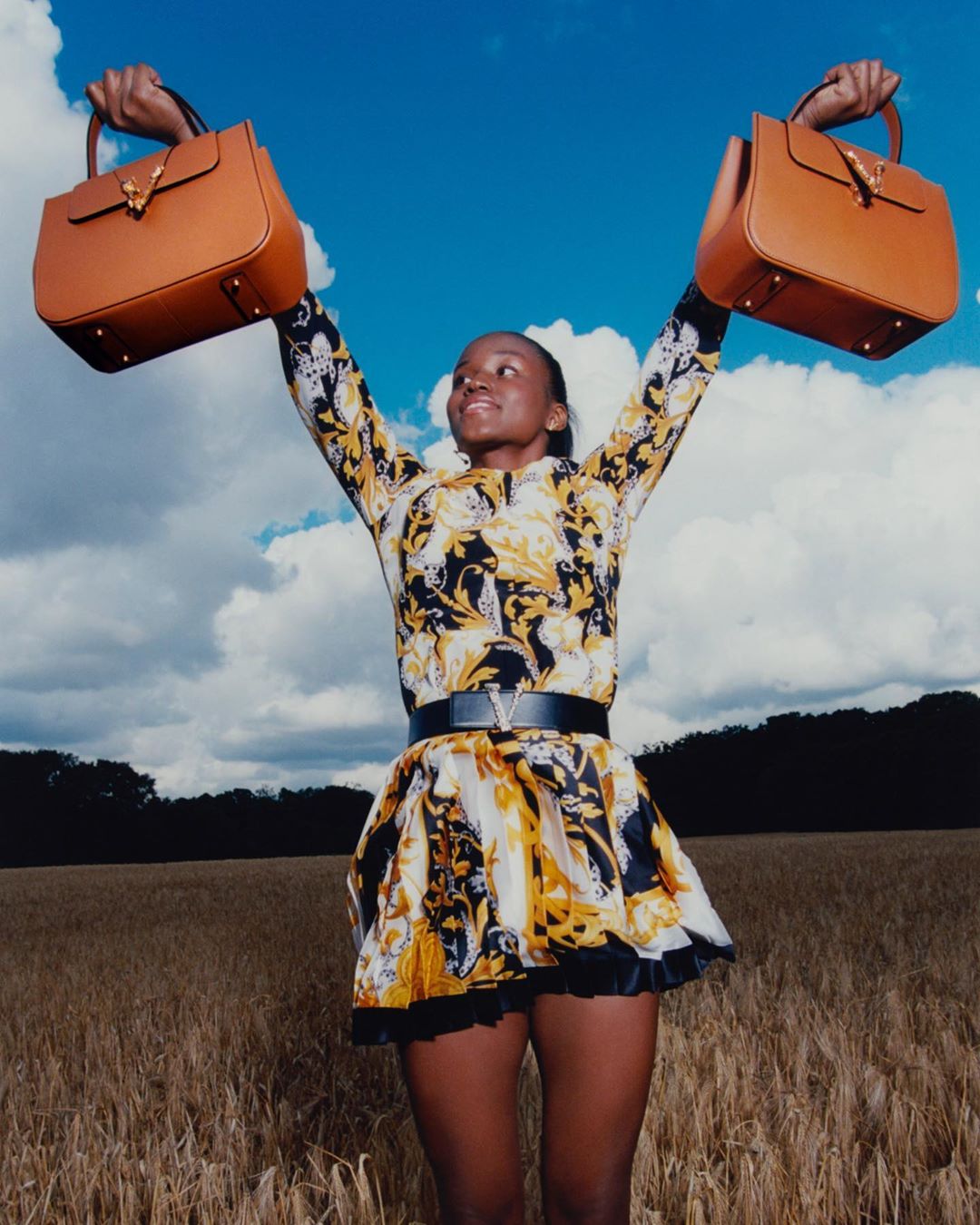 Versace - Raise your hands if you’re #VeryVersace - the @paris.cheer squad perfect their V-shaped victory poses while carrying #VersaceVirtus handbags. Inspired by our Barocco V motif, the series cele...