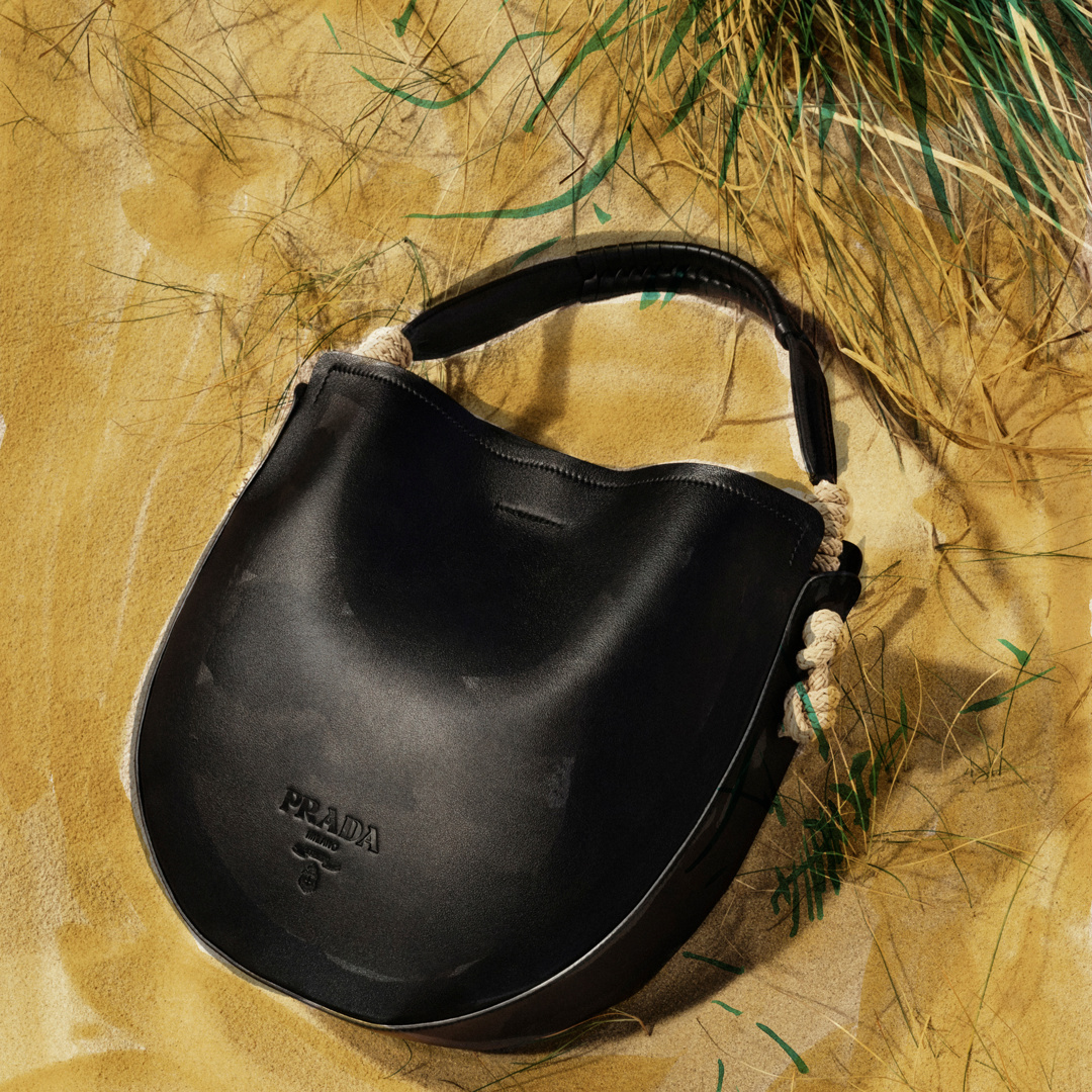 Prada - Memories of sails and sand. Discover the embossed lux purse with knotted cord details and more via link in bio.⠀
#PradaPreFall20⠀
#PaintedinPrada⠀
#Prada