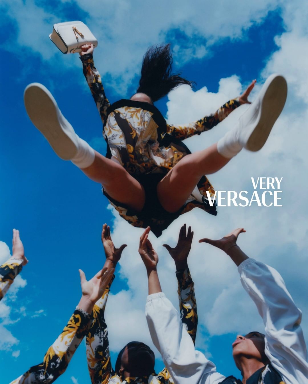 Versace - On the fly - we set the @paris.cheer squad the challenge of creating V-shaped stunts in celebration of our Barocco V motif. See the full #VeryVersace story through the link in bio.