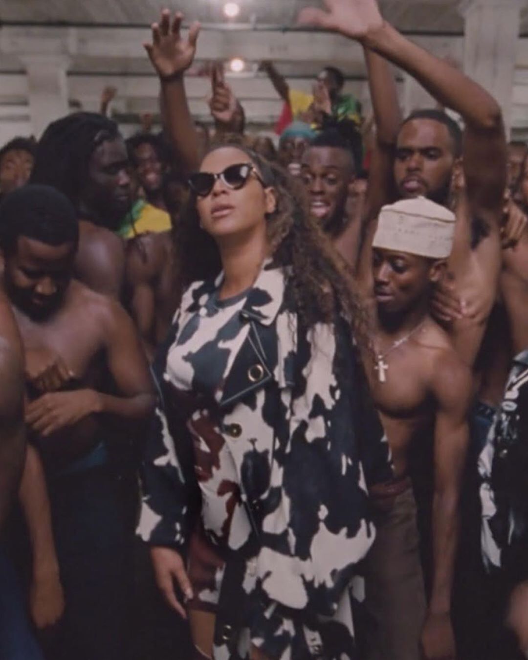 Burberry - #Beyoncé #InBurberry for #BlackIsKing – her new visual album from Disney 
.
Dressed in a cow-print trench coat with matching mini skirt and corset top with faux leather boots, created by #R...