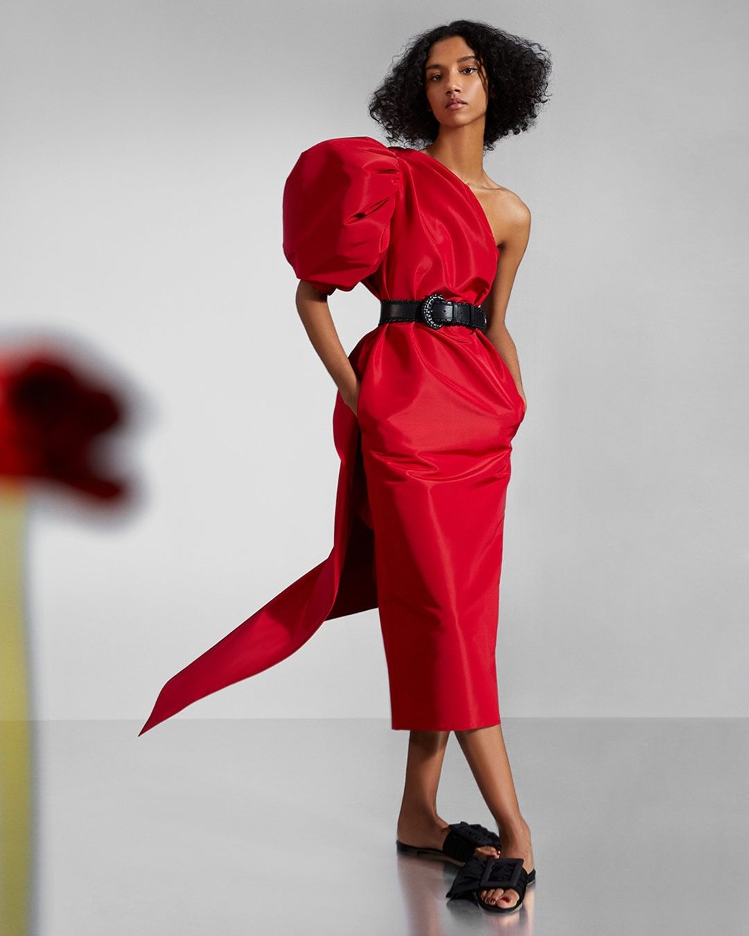 CAROLINA HERRERA - Enchanting and unexpected, this striking red silk asymmetric dress from the #prefall2020 collection by @wesgordon plays with volume and scale to lively effect. 
#CarolinaHerrera