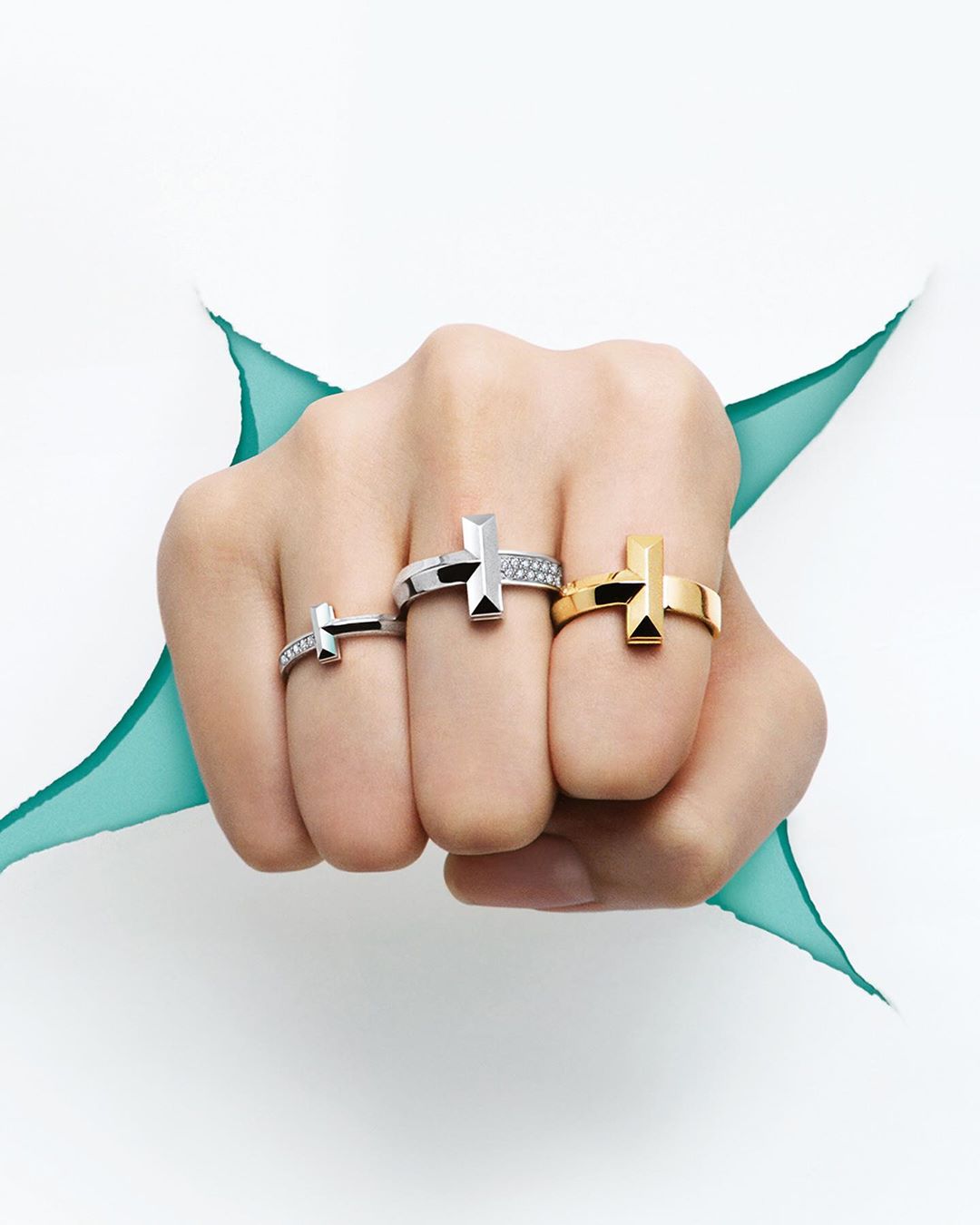 Tiffany & Co. - Full force. The new additions to the Tiffany T1 collection in 18k yellow and white gold make a case for finding a new source of strength. Tap to break through boundaries and discover m...