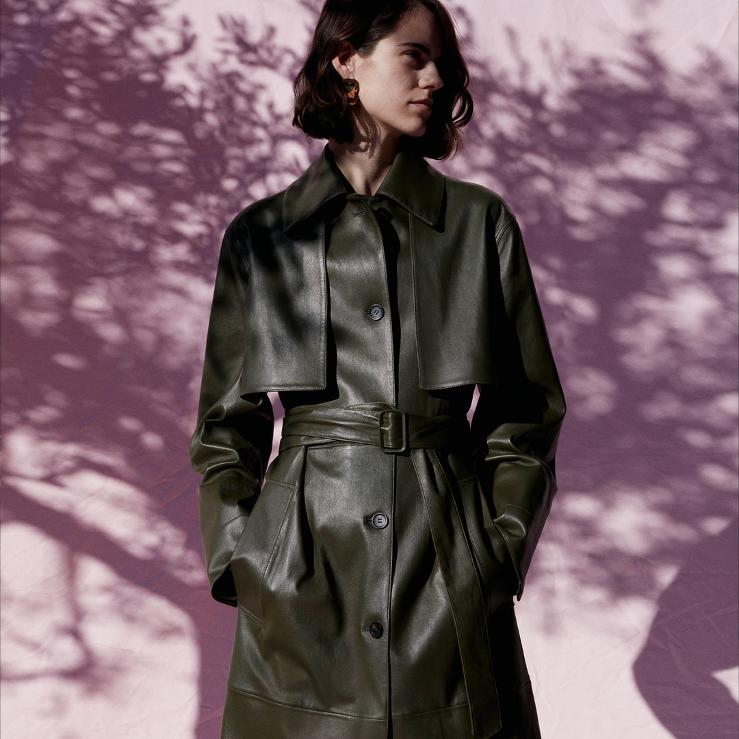 Salvatore Ferragamo - Bold New Signature: a statement trench in sleek olive stretch Nappa is a sure-shot head turner. #FerragamoPF20