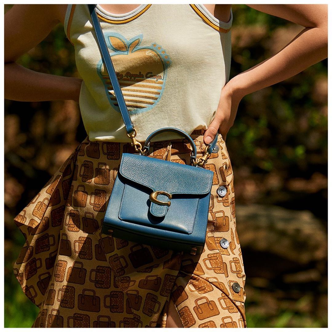 Coach - We’re breezing into your feed with pretty colors and summery vibes. (This tiny Tabby top handle is no small deal.) #TabbyBag #CoachNY