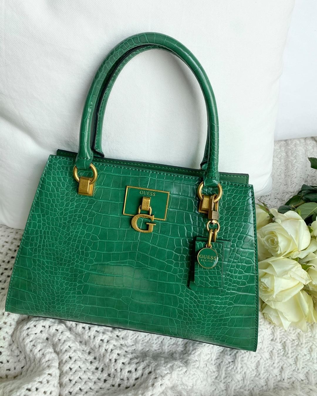 GUESS - our current crush: the stephi bag 💚 #NationalHandbagDay