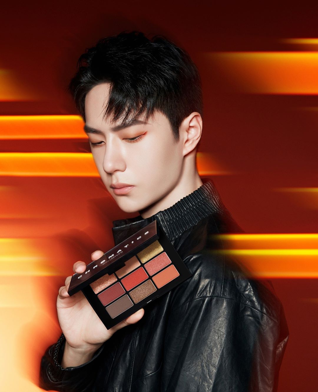 shu uemura - our shu uemura global ambassador wang yibo, the talented young actor, dancer and singer, is rocking high fashion orange tones with a 3D sparkle that evokes the Tokyo night lights from our...