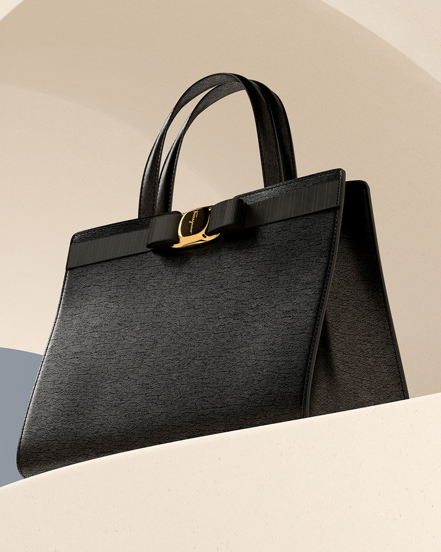 Salvatore Ferragamo - Crafted with generations of artisanal expertise, the elegant Vara Bow Bag features the signature grosgrain bow in a gleaming gold plaque bearing the Salvatore Ferragamo insignia....