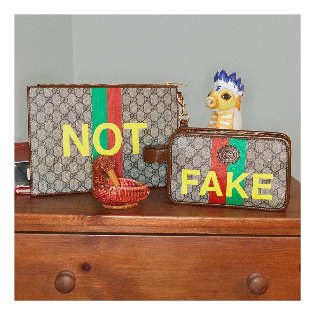 Gucci Official - A printed green and red stripe—a reinterpretation of the Web—enriches #GucciFakeNot pouches and wallets, reinforcing the symbolic connection to the House. Discover more through link i...