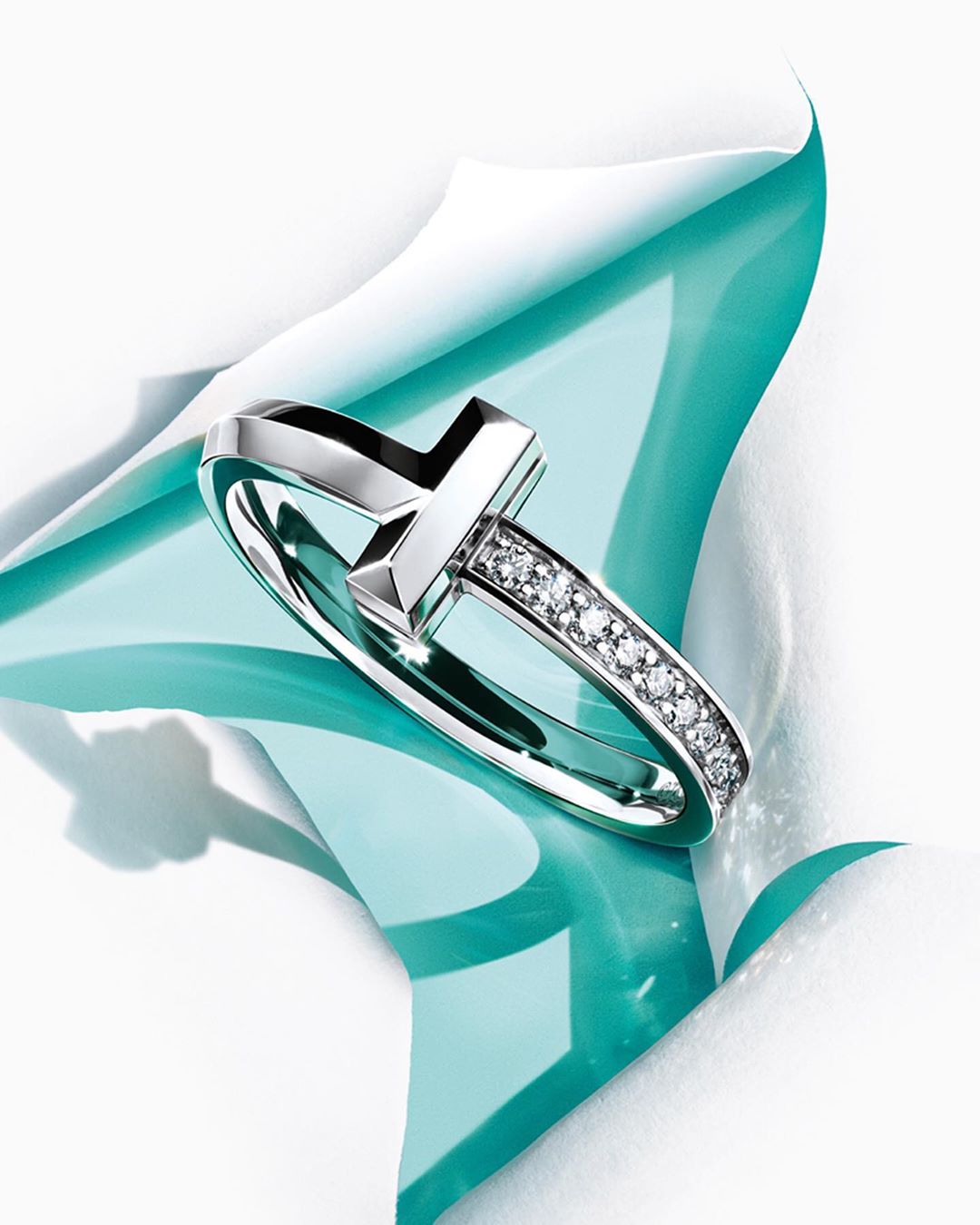 Tiffany & Co. - No introductions necessary. The Tiffany T1 collection, now in 18k white gold, showcases Tiffany’s long-standing tradition of unmatched technique and artistry. Tap for T and discover mo...