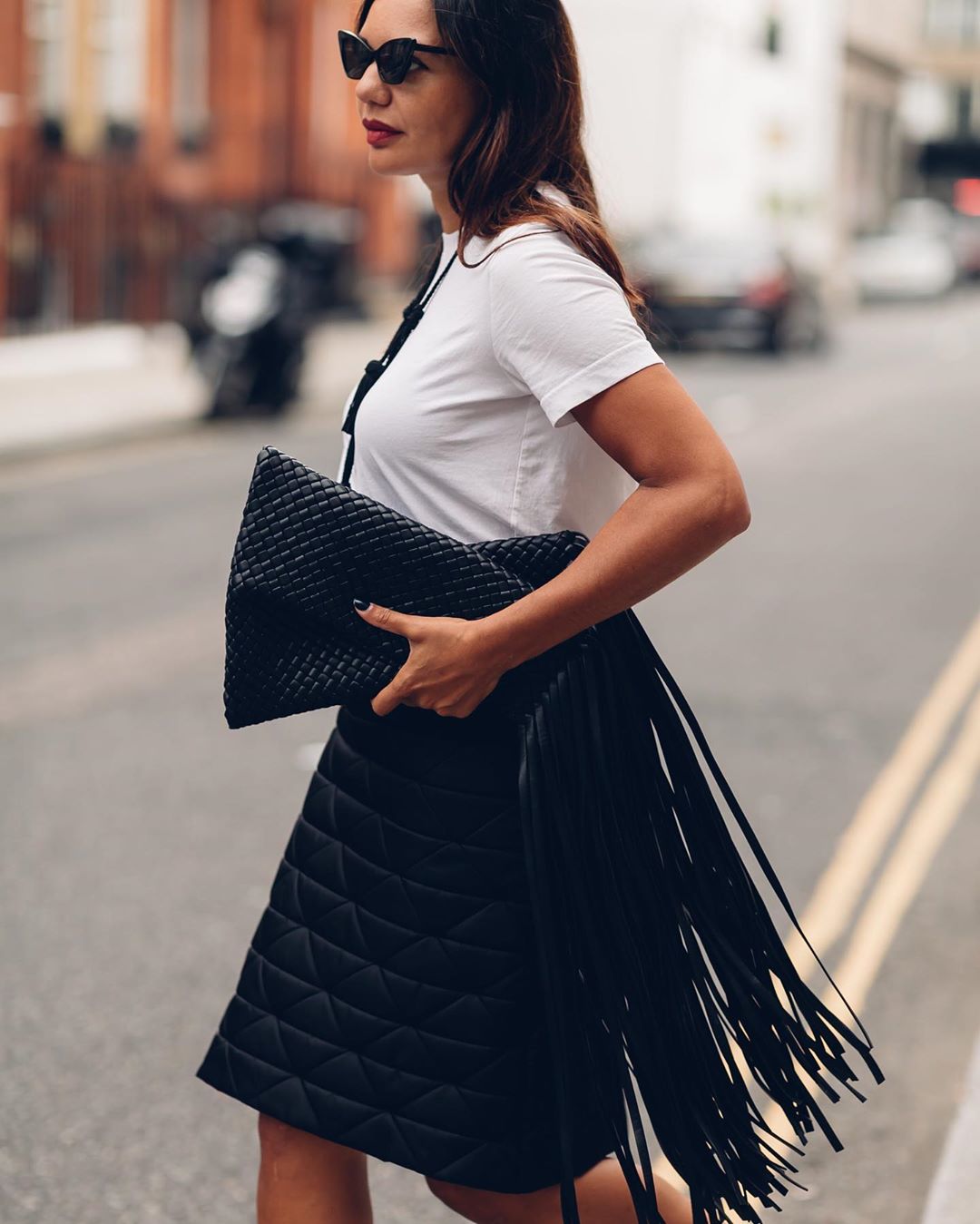 Harrods - How does a fashion director elevate a classic white tee? With talking-point accessories, such as @bottegaveneta’s BV Fringe Crisscross clutch – as seen on @lydsking.

Find #BottegaVeneta in...