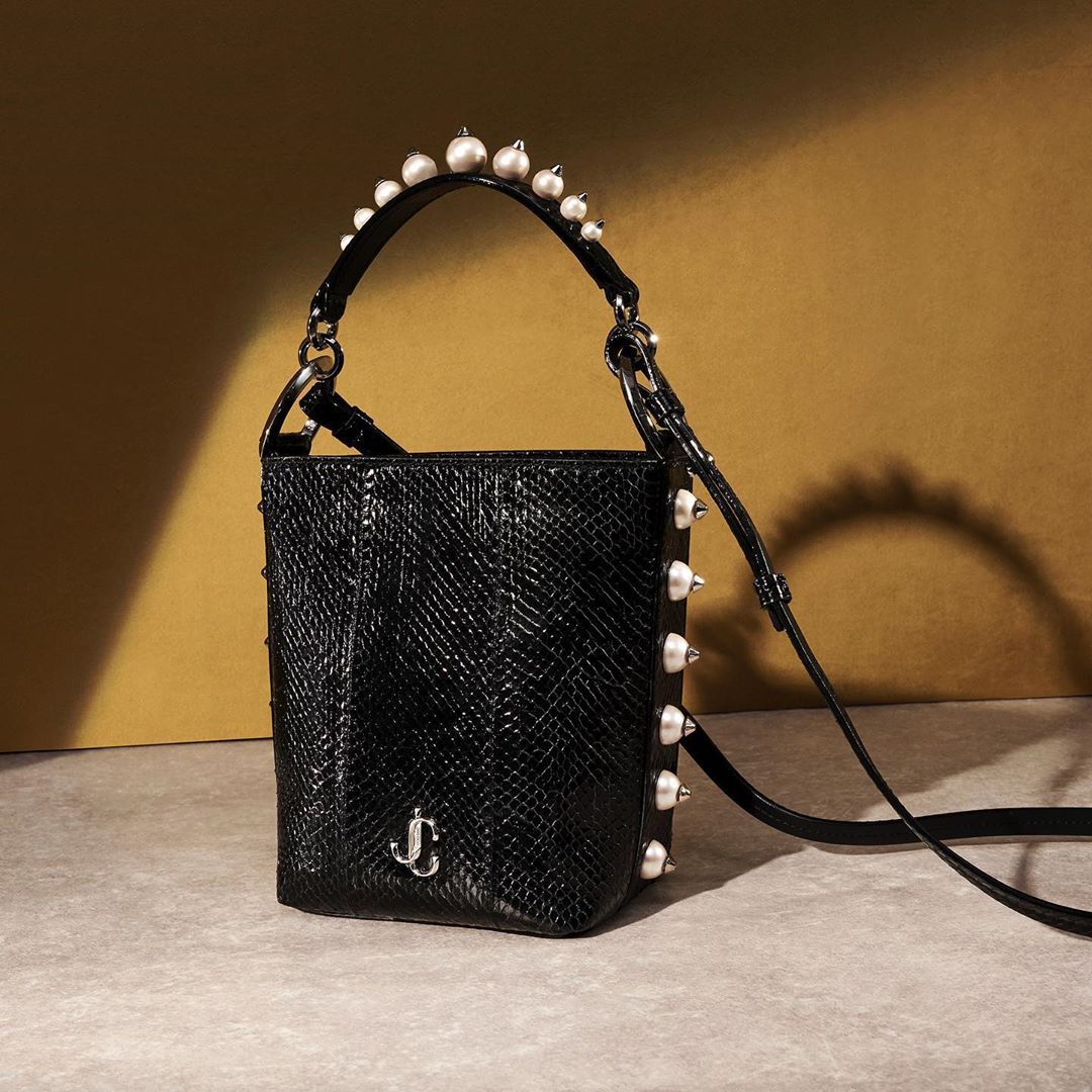Jimmy Choo - Get carried away with the VARENNE BUCKET bag featuring pearl trim #JimmyChoo