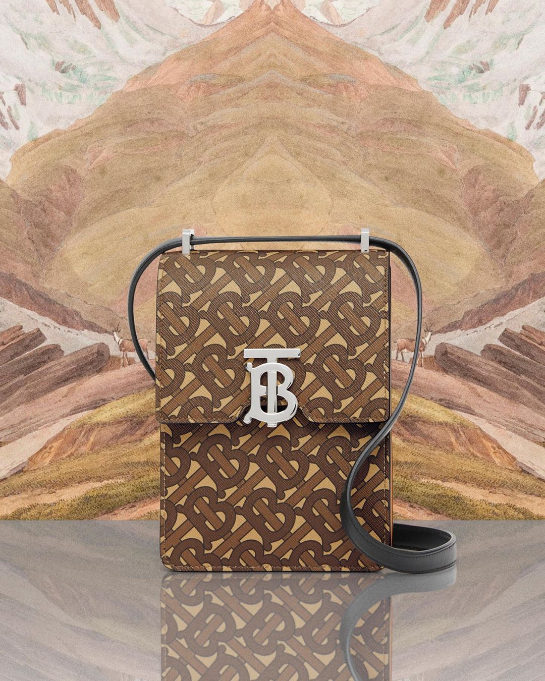 Burberry - Force of nature
.
Introducing a fresh iteration of the Robin bag – crafted from environmentally conscious e-canvas detailed with a #ThomasBurberryMonogram clasp 
.
#Burberry