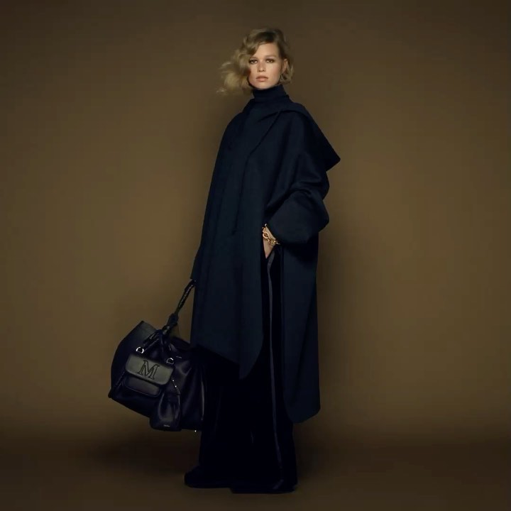 Max Mara - Epic proportions. The hooded cashmere cape meets the new #MaxMaraFW20 Marine bag in this monochromatic look worn by @annaewers for the #MaxMaraFW20 campaign shot by @brigitteniedermairstudi...