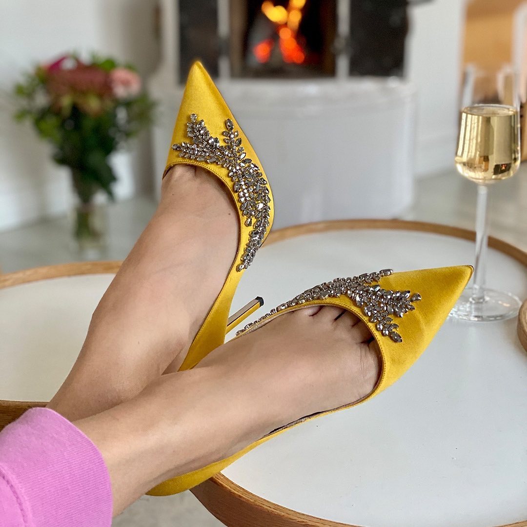 Jimmy Choo - Add colour to your at-home cocktail hour like @ingridwilkinson with our sparkling LOVE heels in jewel bright yellow satin.

Show us how you’re wearing your Choos at home and tag @jimmycho...