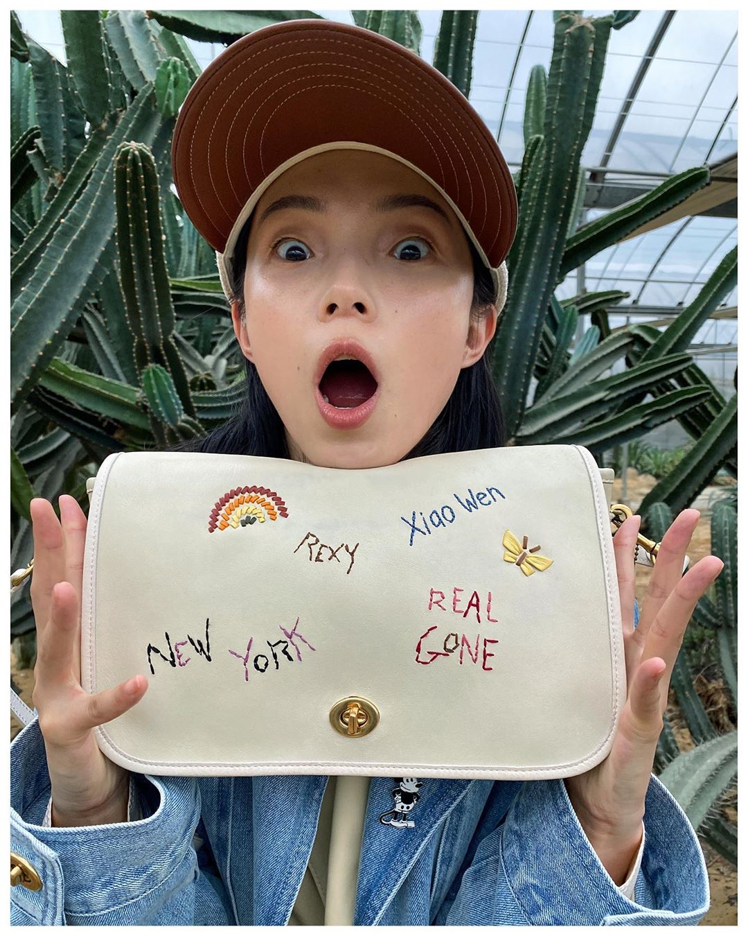 Coach - Our face as we see #CoachForever unfolding. ✨ Model #XiaoWenJu’s look is brimming with joyful details (and she can’t wait to share them with you). 
.
.
Xiao Wen wears a mix of old and new Coac...