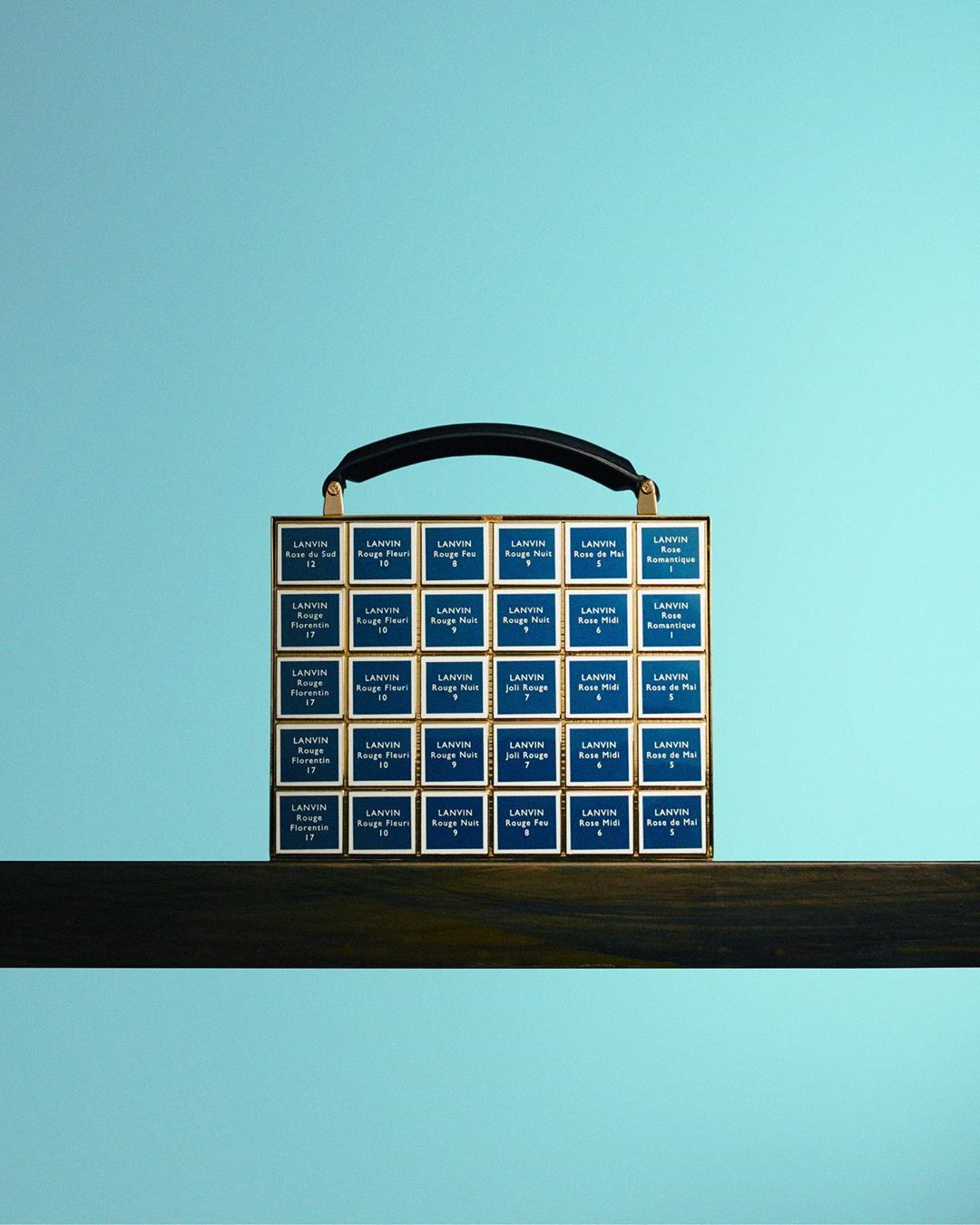 LANVIN - The “lipstick“ minaudière bag echoes to the vintage #LANVIN beauty drawer storing a palette of lipsticks refills from the 1930s, and their colorful titles, such as “Rouge fleuri“ or “Rose ro...
