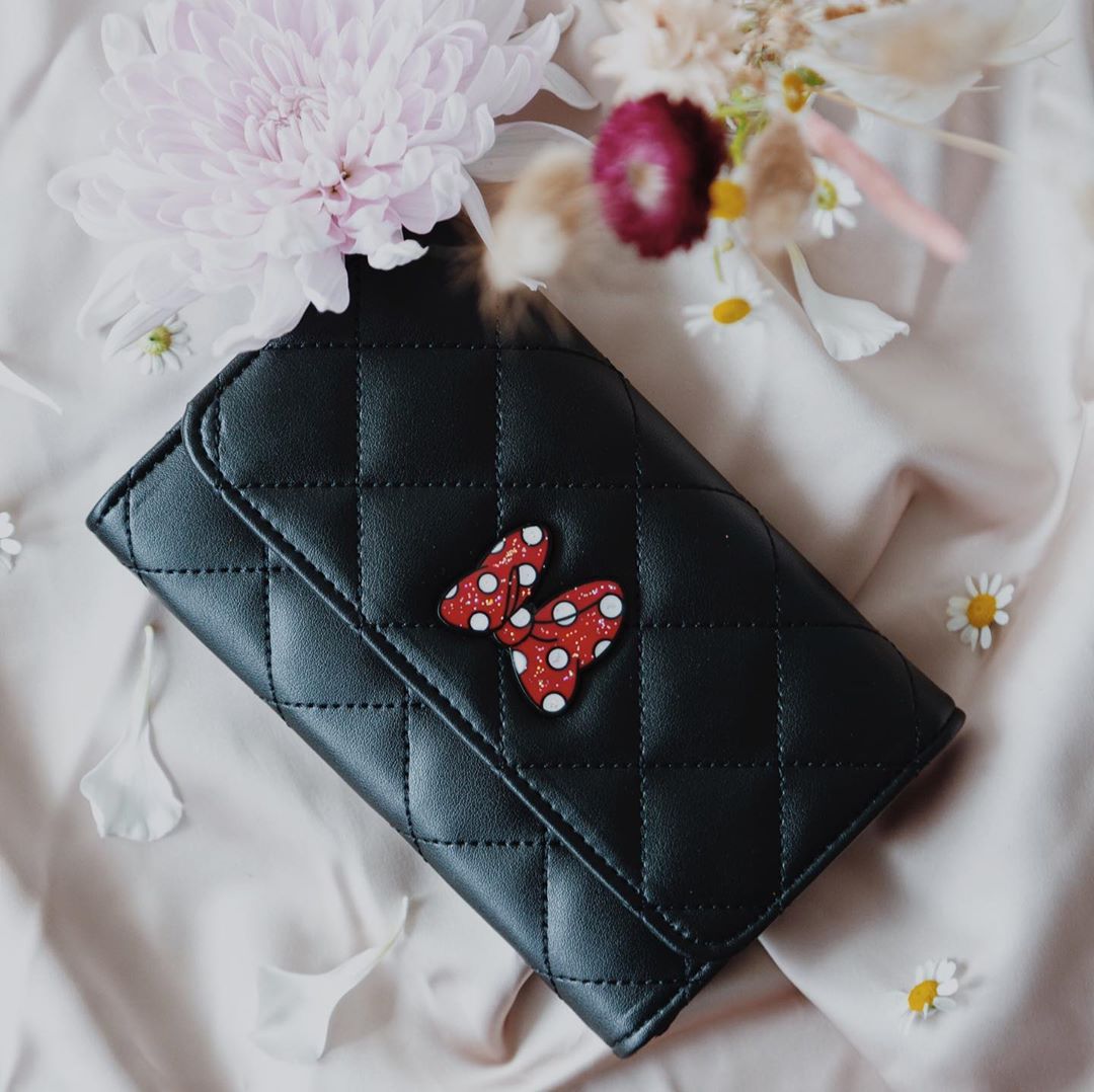 Minnie Style - Just a pocket full of Minnie 🎀 Head to our link in bio to shop the @buckledownproducts Minnie Wallet!
