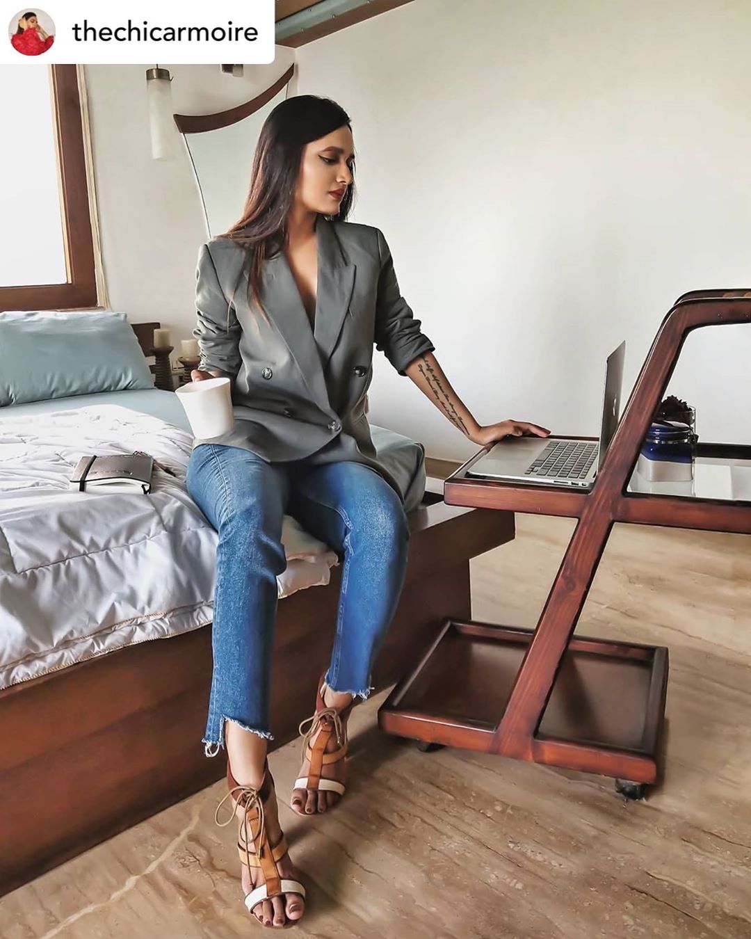 AJIO. com - Blazer and lounge pants for a video con call? @thechicarmoire has deleted that option with this bold WFH look. 
.
What’s YOUR bold style move going to be? Shop the AJIO.com #BigBoldSale in...