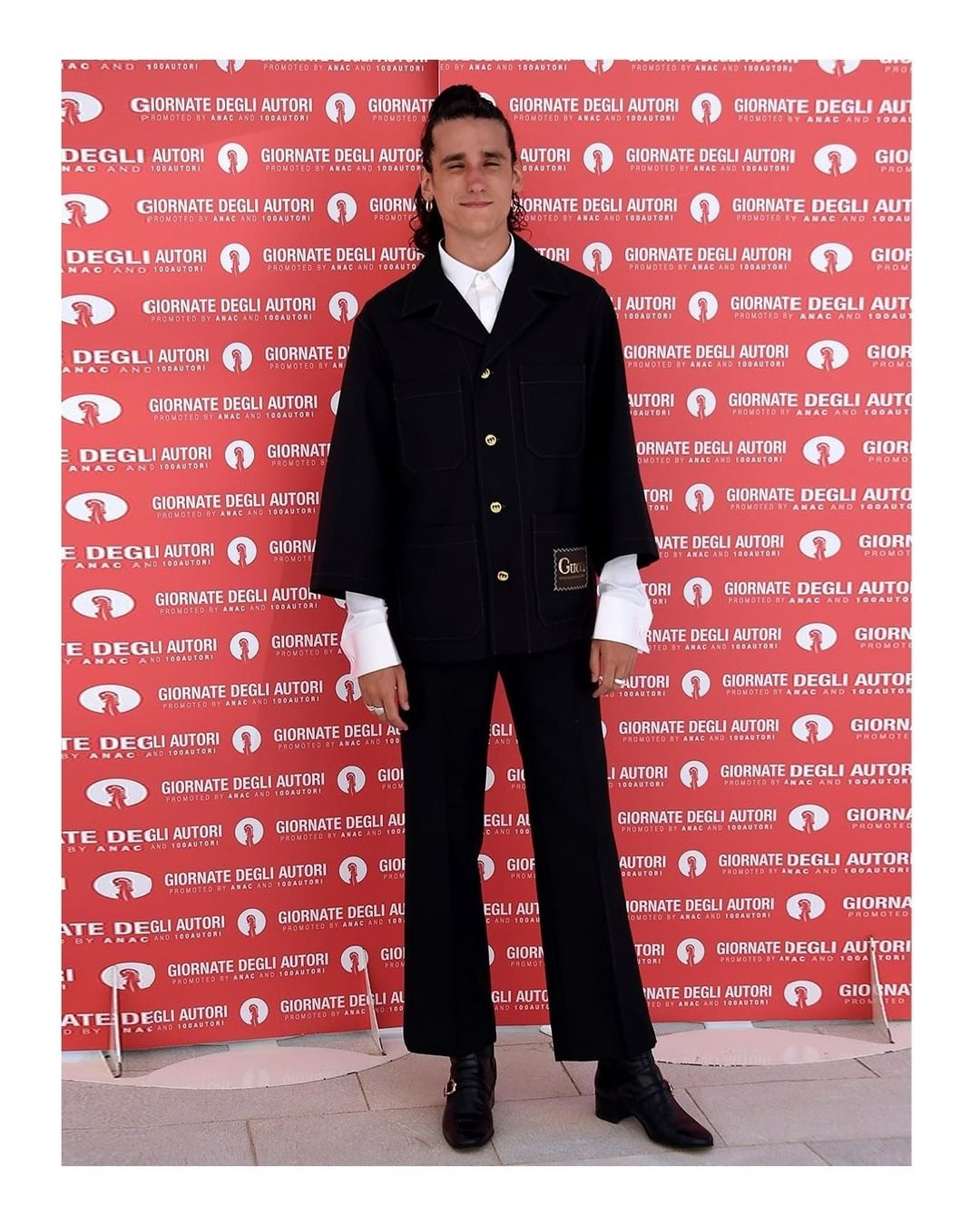 Gucci Official - Actor #AndreaCarpenzano @carpetta1 in a #GucciPreFall20 panama wool mohair shirt with label detail and matching pants, fine poplin evening shirt and leather boots with gold buckle det...