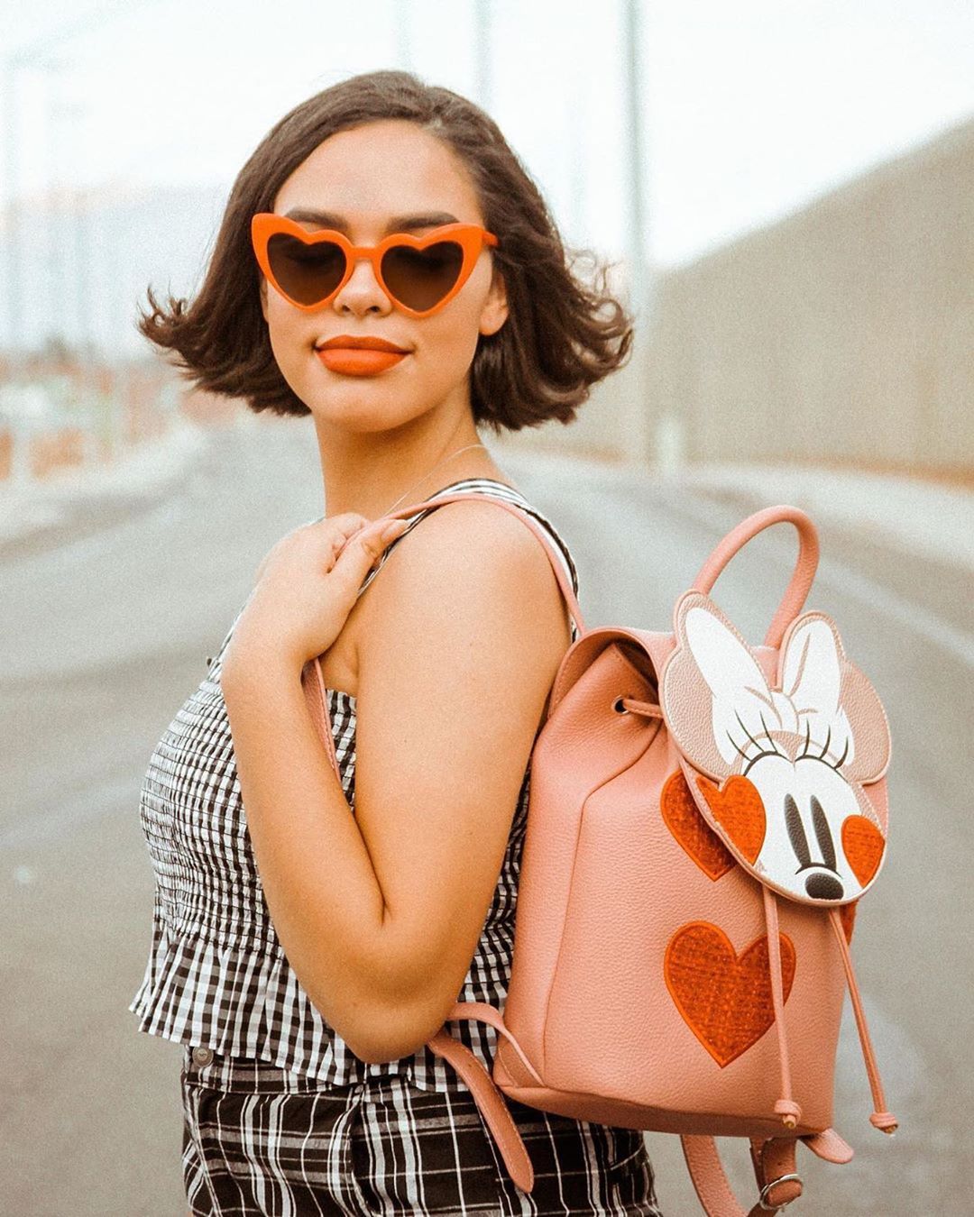 Minnie Style - We’ve got major 😍 for @itssimplysky’s #MinnieStyle look & her @dnhandbags backpack 💖