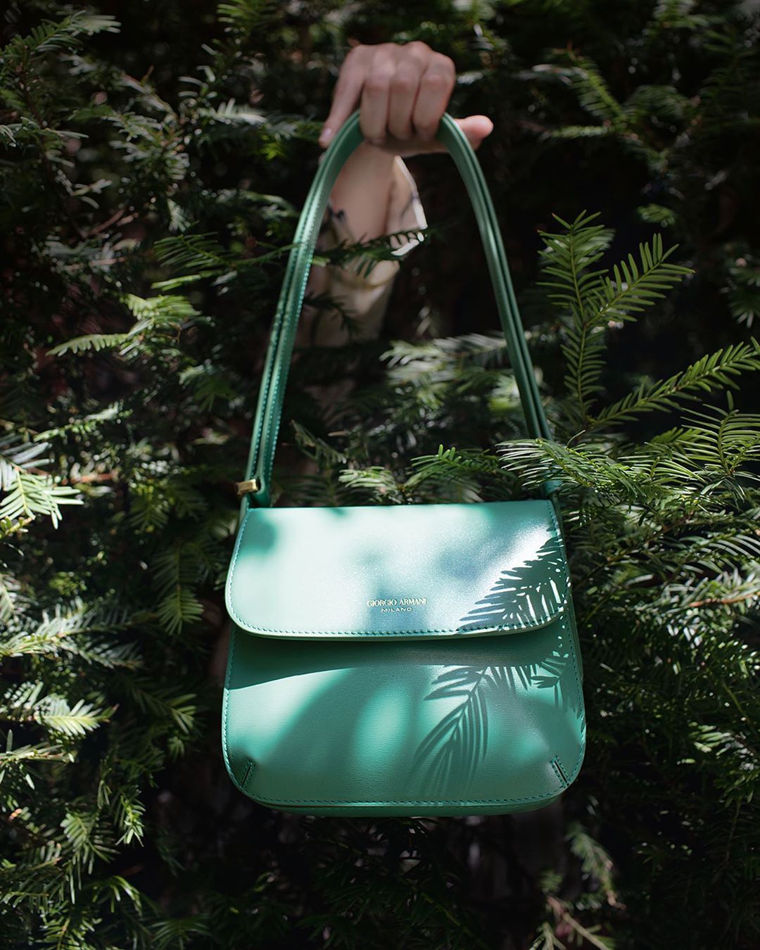 Giorgio Armani - Streamlined yet unforgettable, introducing the #GALaPrima bag in green