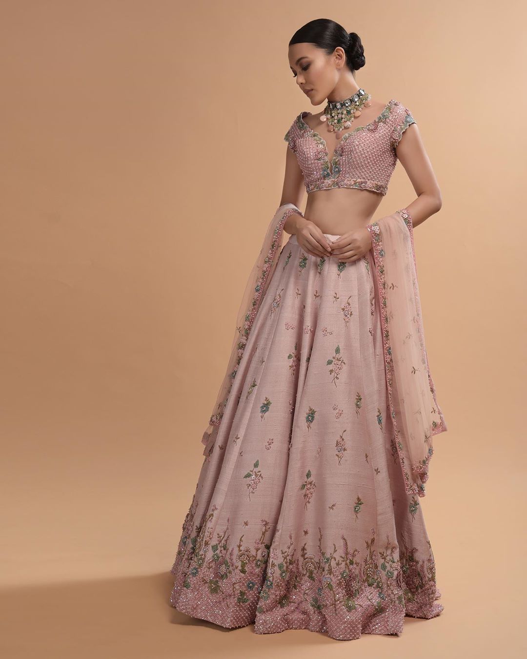 KALKI Fashion - #kalkixkesa🧚🏻
#TaleoftheIcyPinks🌸
Rock this icy pink lehenga for your daytime intimate wedding. Adorned with 3D resham flowers embroidered blossoming floral butti work, the lehenga glo...