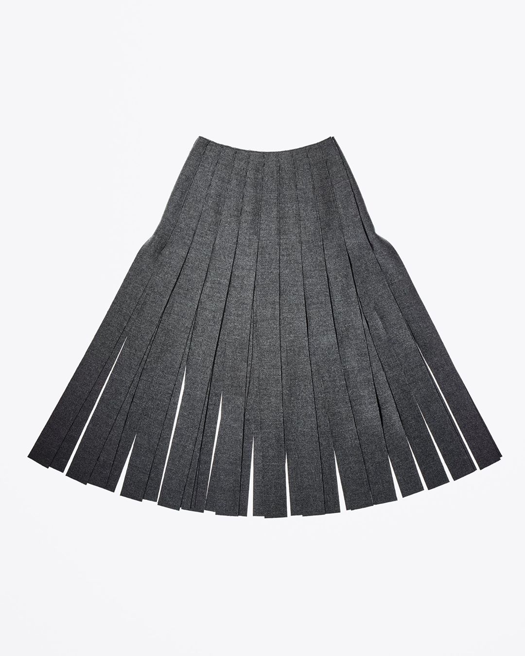 Prada - Item for bid in the #PradaFW20 #auction: the wool pleated fringe skirt worn by Laura Reyes on the Milan runway. 
One-of-a-kind show pieces are up for bid #October2 to 15 as a collaboration wit...