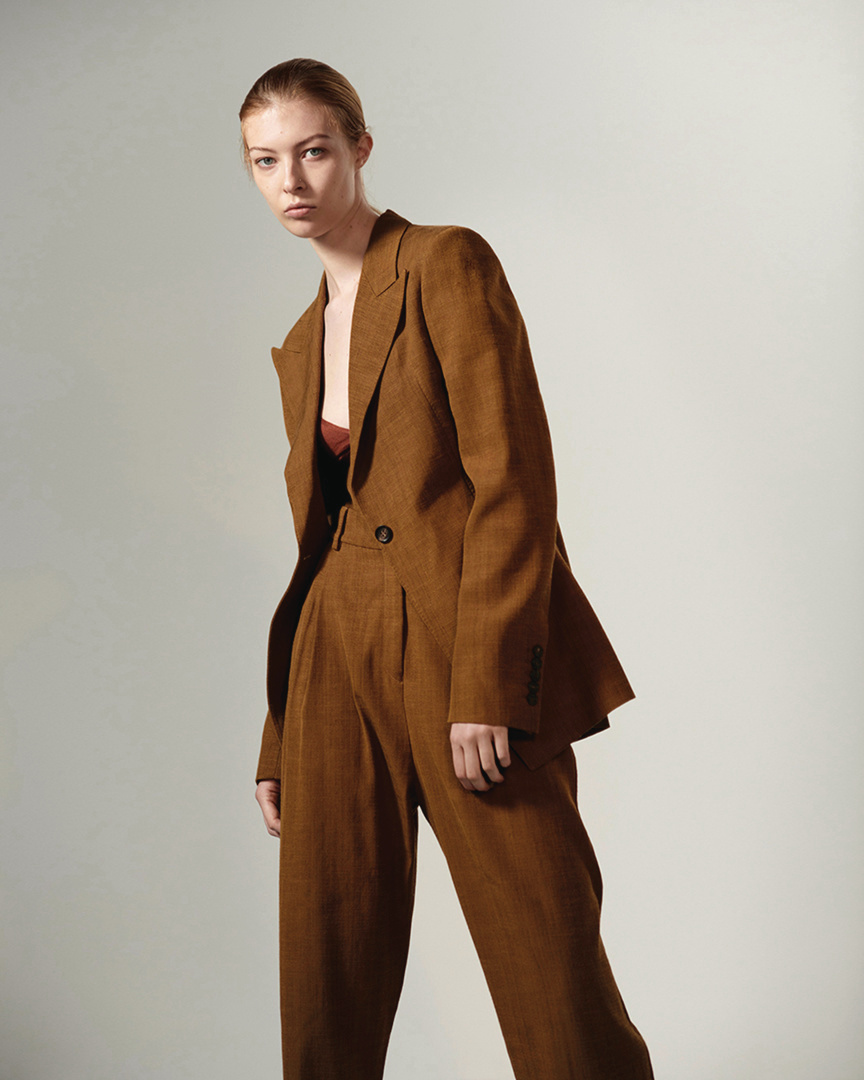 Salvatore Ferragamo - Lessons in modern power dressing, with an immaculately tailored amber suit from #FerragamoAW20 on the pages of @vogueitalia