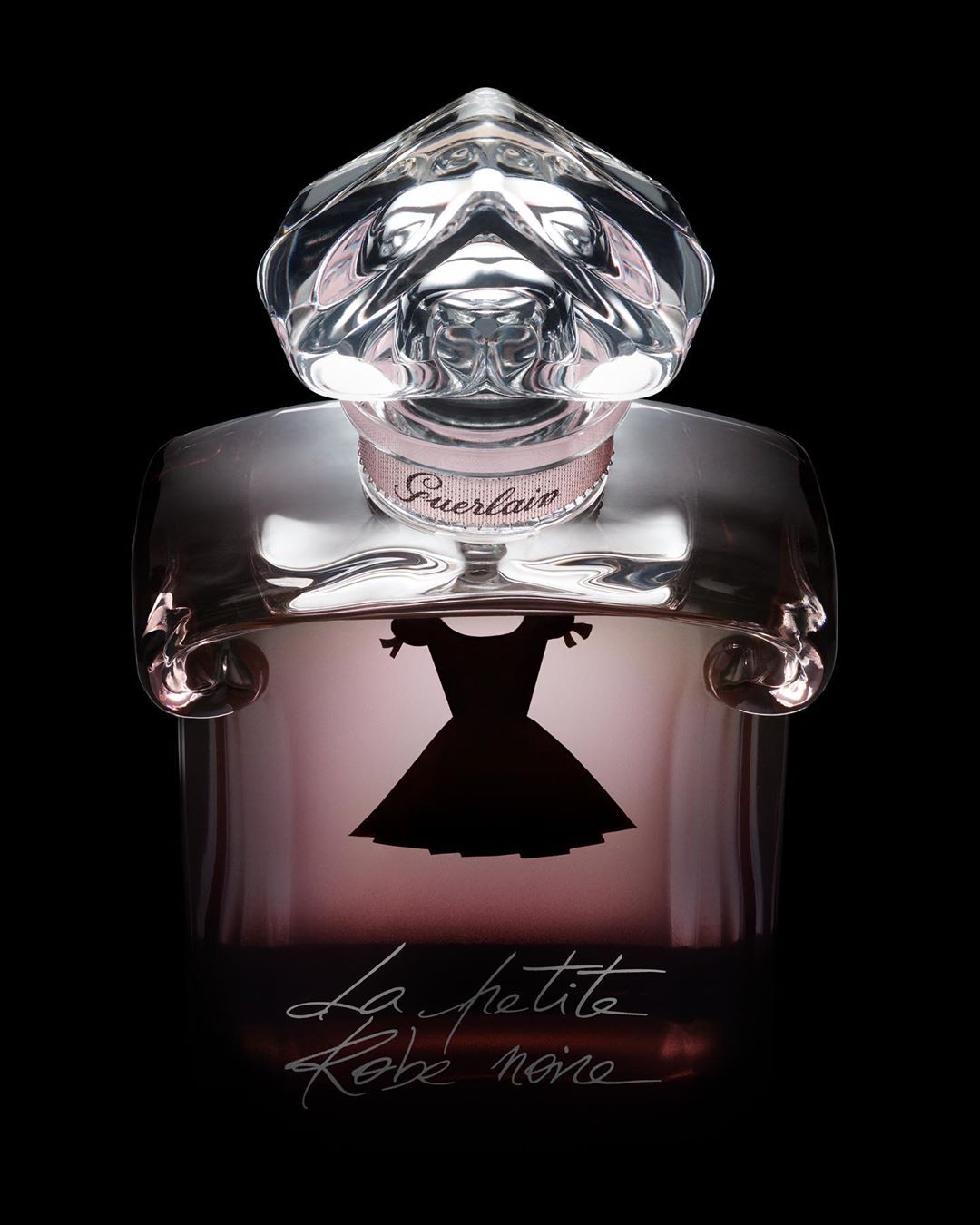 Guerlain - A timeless fragrance with a modern twist, Guerlain's iconic "heart-shaped" bottle has been boldly reinterpreted in order to house La Petite Robe Noire. Fading from black to powdery pink, th...