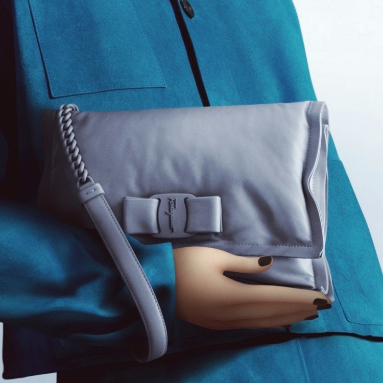 Salvatore Ferragamo - Embrace the Blues: supple and exquisite, the stormy sky Viva Bow Bag, perfectly complemented by a sumptuous suede outfit of Sicilian sky blue. #VivaBowBag