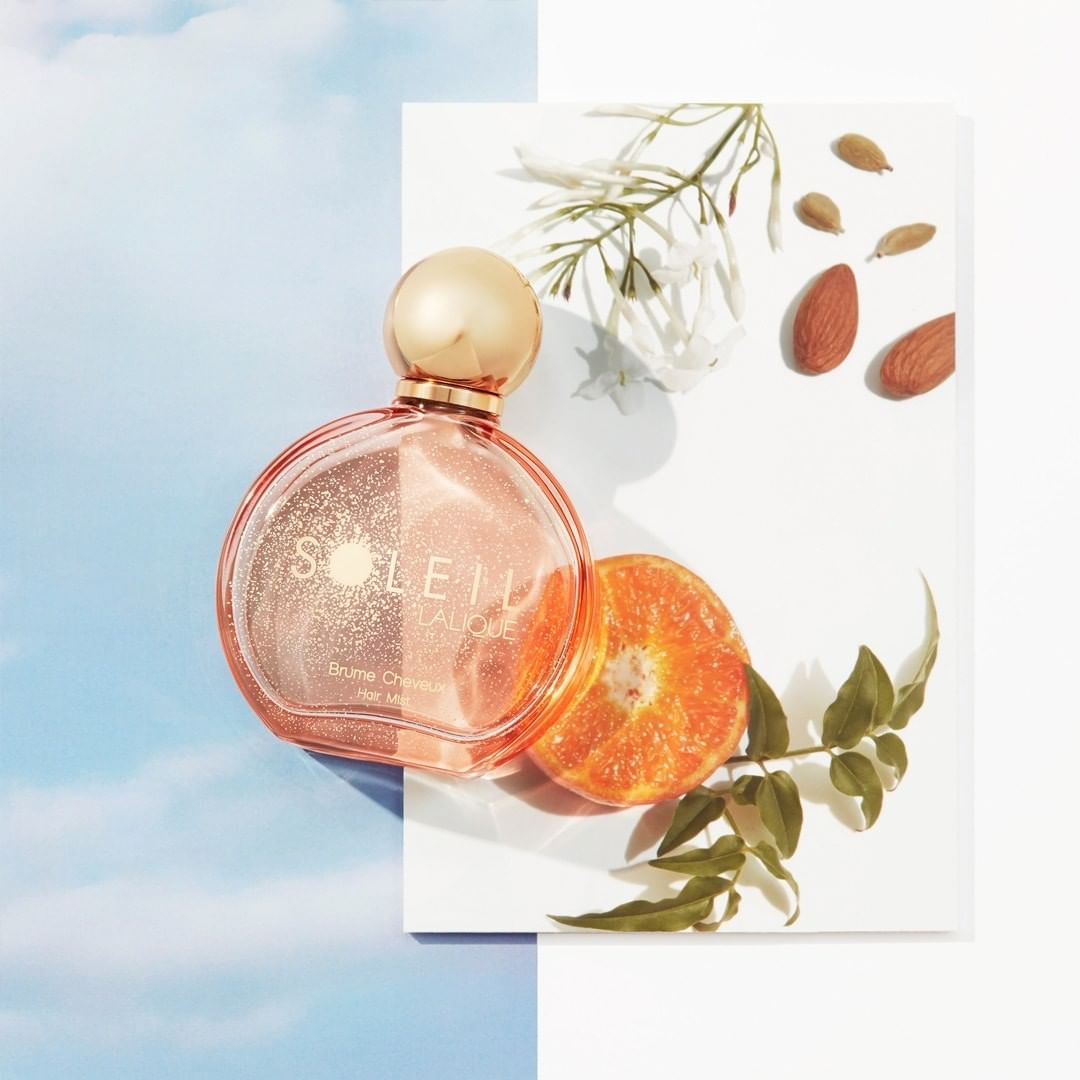 LALIQUE - With the new Hair Mist, take Soleil Lalique with you anywhere, anytime – from the dressing table to the office, or from the gym to an evening out. Easy to slip in your bag to refresh your fr...