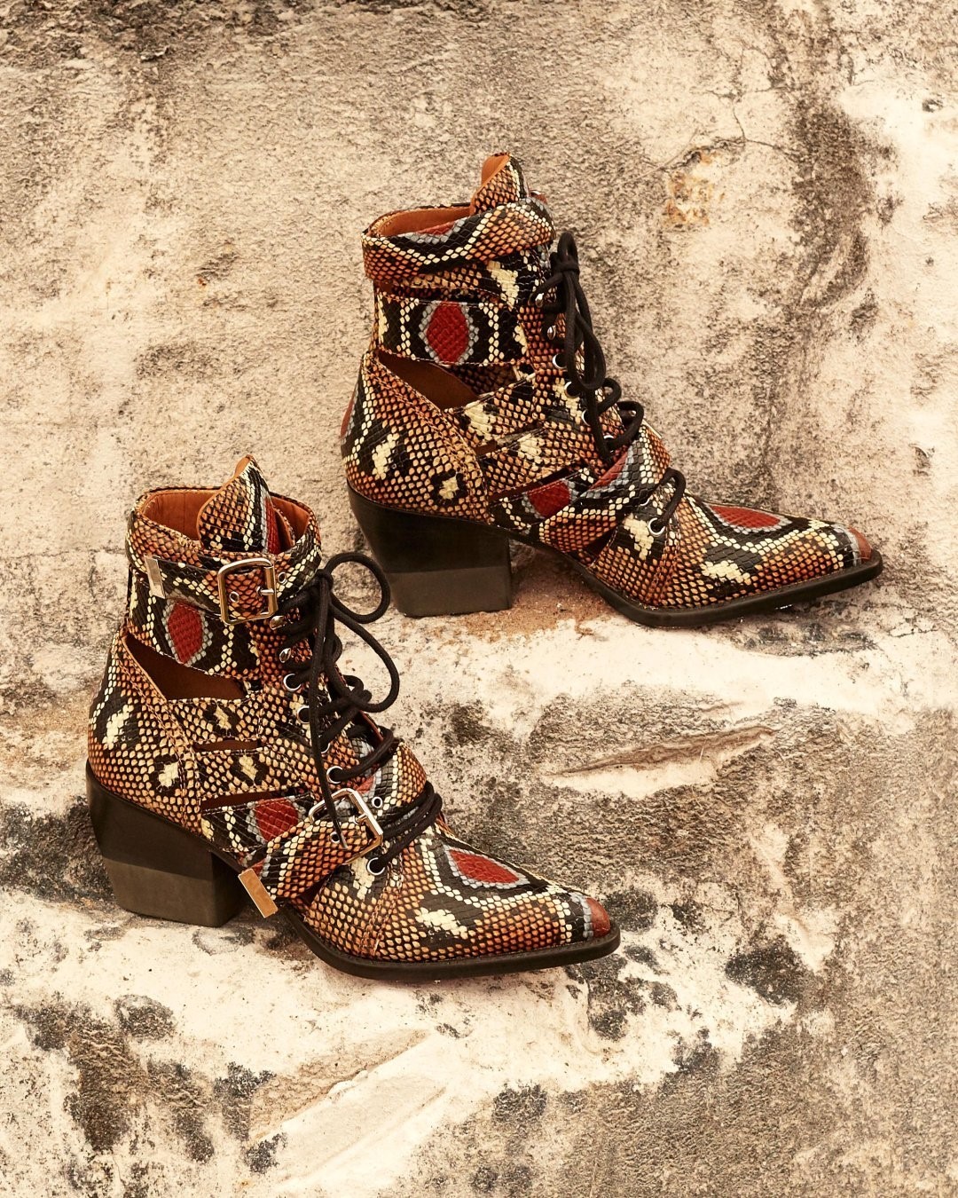 THE OUTNET - If @chloe's Rylee boots weren't already in your Wish List, this snake-effect style is sure to change that. 

Shop all your favorite Instagram looks, just visit #linkinbio