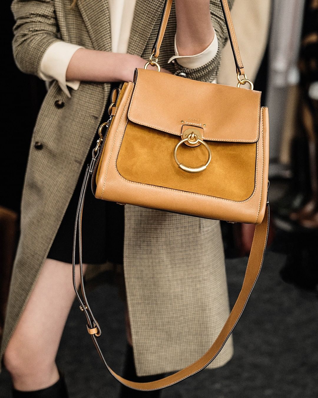 Chloé - The new Tess Day comes in golden tan as a warm and wearable neutral

Explore #CHLOEfall20 bags in boutiques and on chloe.com

#CHLOE