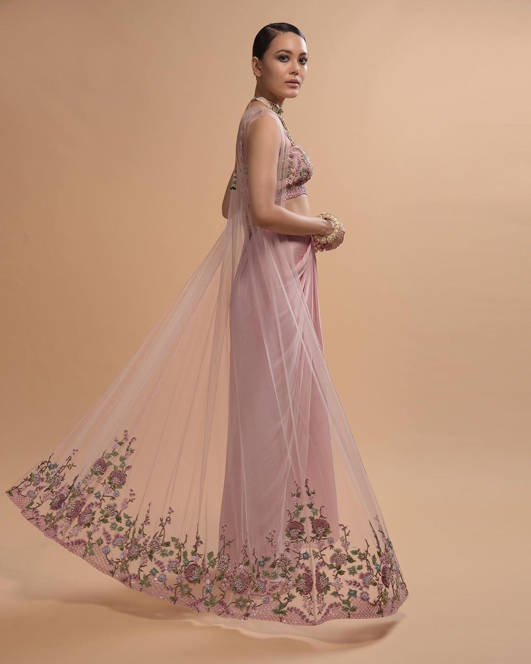 KALKI Fashion - #kalkixkesa🧚🏻
#TaleoftheIcyPinks🌸
The design reflects flamboyance, which is enhanced further by the scintillating sparkle of the iconic embroidery. This fancy draped skirt is teamed wi...