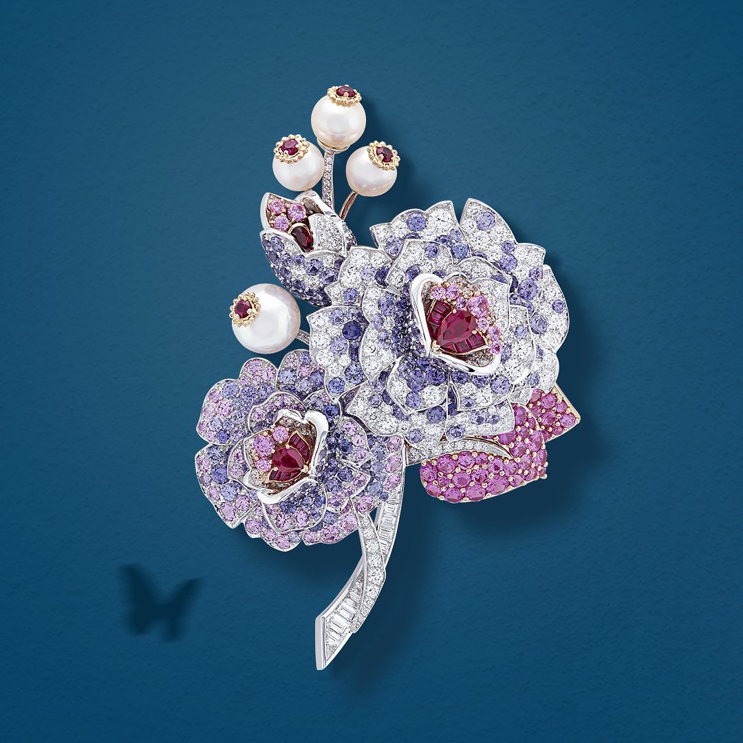Van Cleef & Arpels - From one bouquet clip to another, the playful butterfly guides you around the colorful petals of these High Jewelry clips. #VCAflora #VanCleefArpels