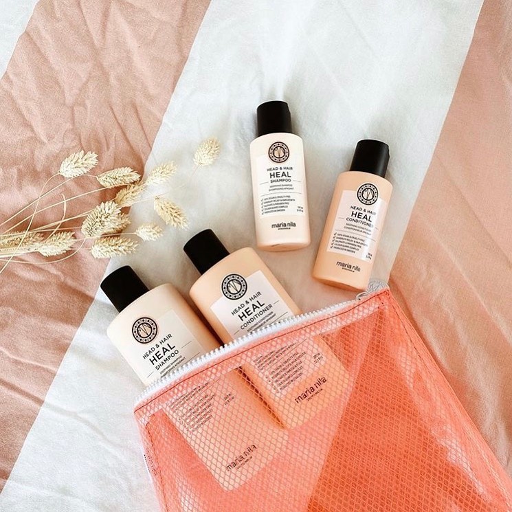 Maria Nila Stockholm - Our Head and Hair Heal beauty bag 🌾. Heal increases hair growth and gives you a healthier scalp! Each bag includes a full size and a travel size shampoo + conditioner.📷:@beautyb...