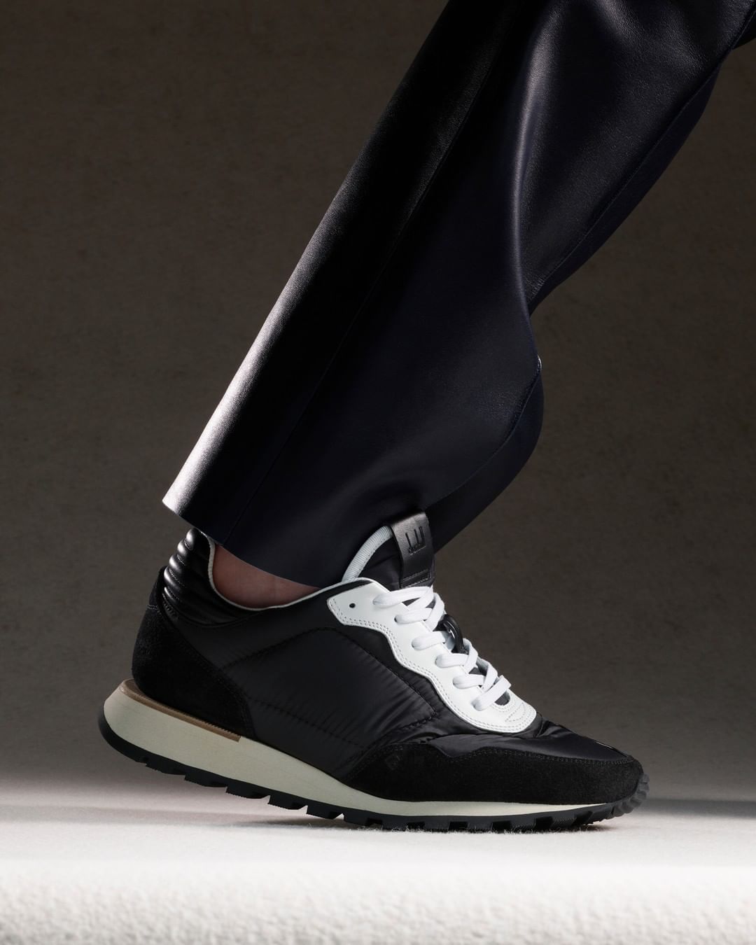 dunhill - AXIS⁠
With references to vintage running shoes of the 1970s and 80s, our new Axis runner is constructed from technical nylon, suede and quilted leather. Made in Italy. Features a chunky sole...