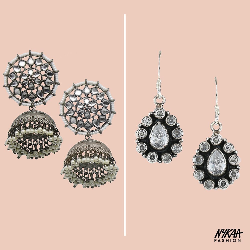 Nykaa Fashion - It may be hard to find a silver lining this year so we’ve found two for you✨Extra or everyday, which earring from our festive sale are you adding to your cart🛒
•
•
Teejh Silver Antique...