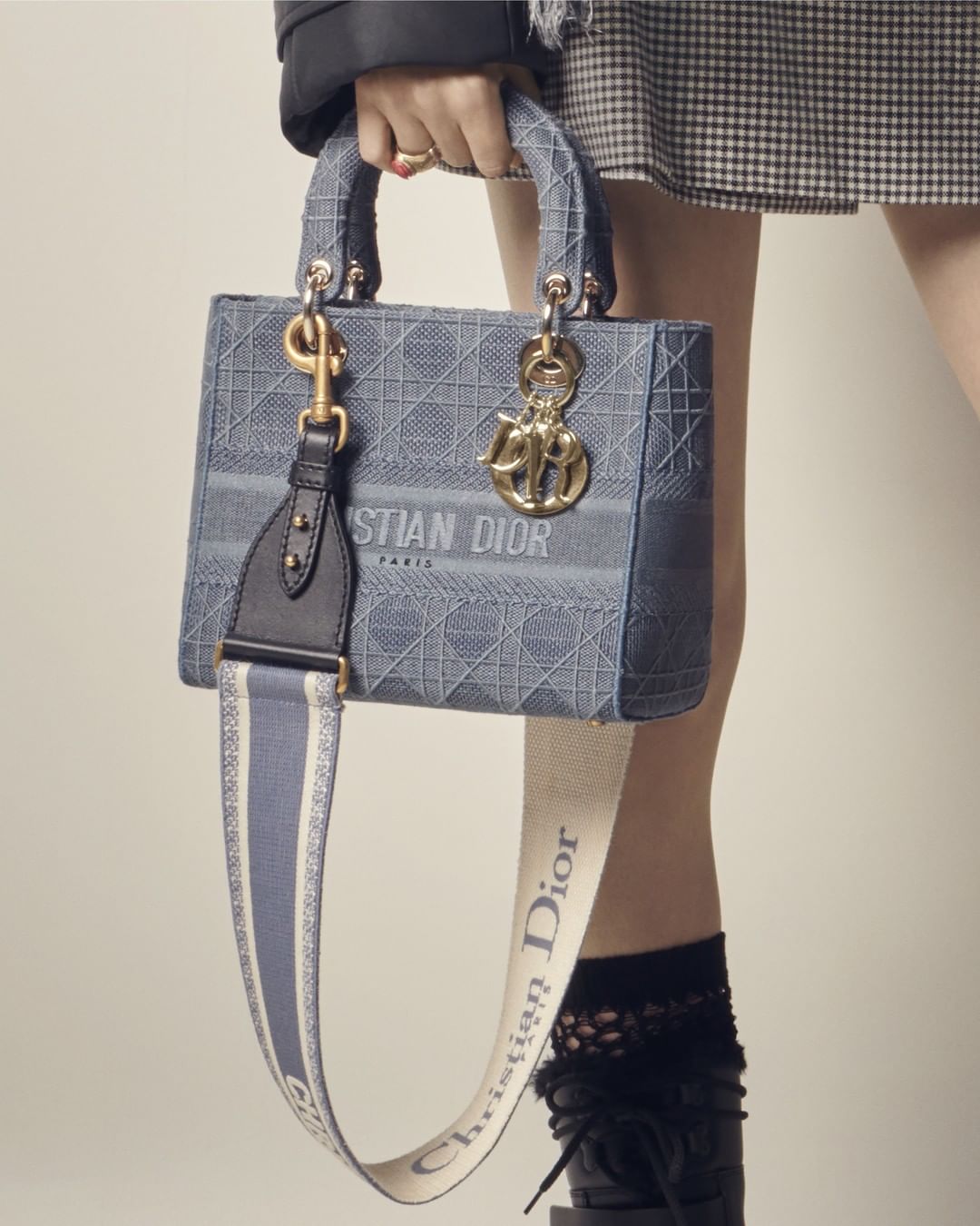 Dior Official - The denim blue, Cannage-embroidered #LadyDLite – the younger sibling of the classic #LadyDior - is an unquestionable object of desire from the #DiorAW20 collection by @MariaGraziaChiur...