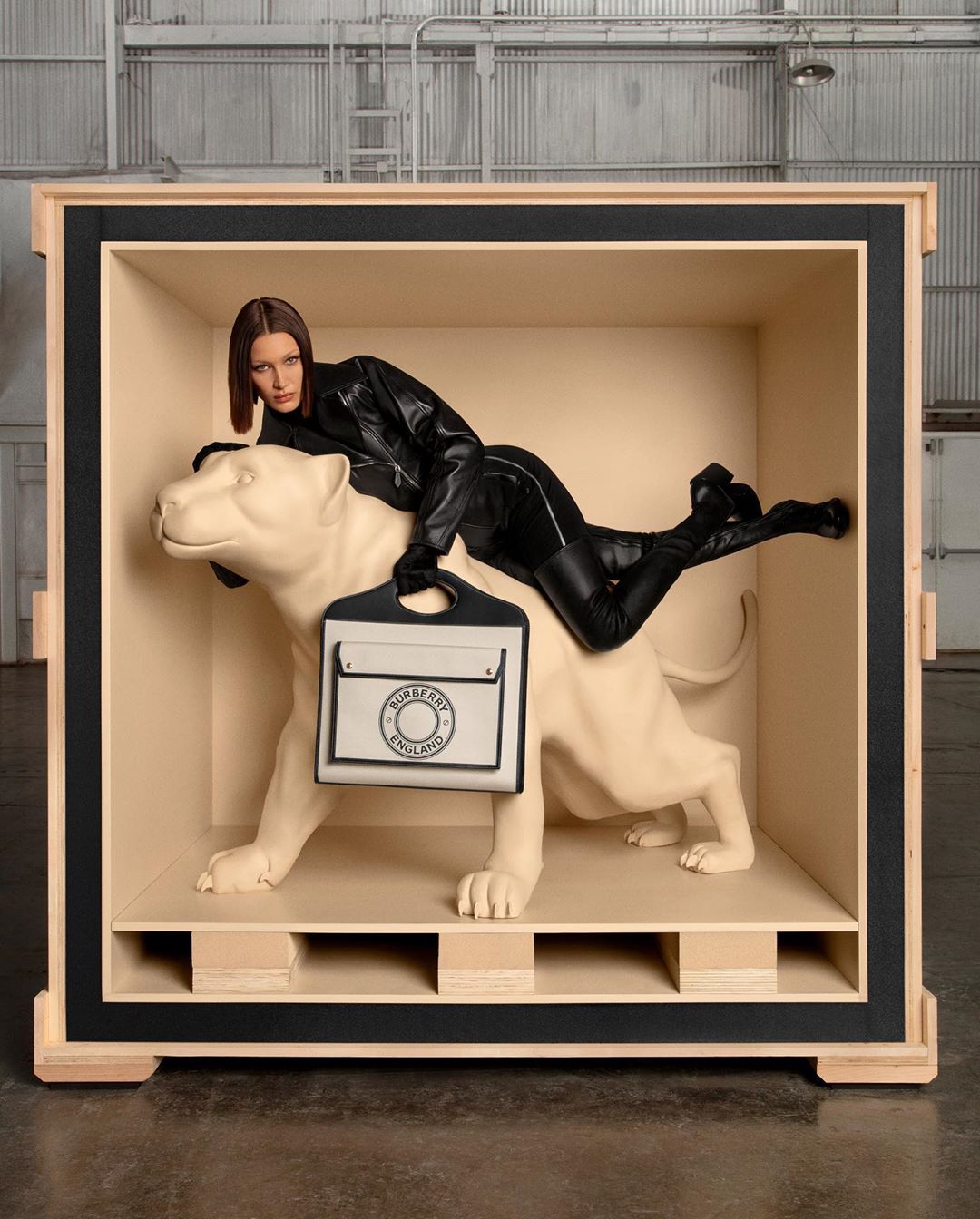 Burberry - #BellaHadid’s feline femininity embodies a bold animal instinct for #ThePocketBag 
.
Bella carries the medium tote in canvas and topstitched leather, emblazoned with our distinctive logo gr...