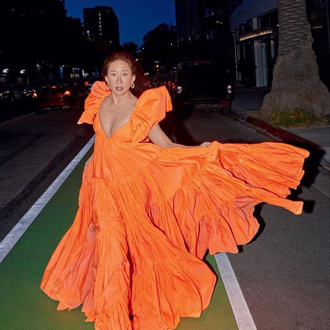 Valentino - Actress #SandraOh was photographed by @gregswalesart in an orange taffeta dress from #ValentinoSS20 for the June issue of @ellecanada.